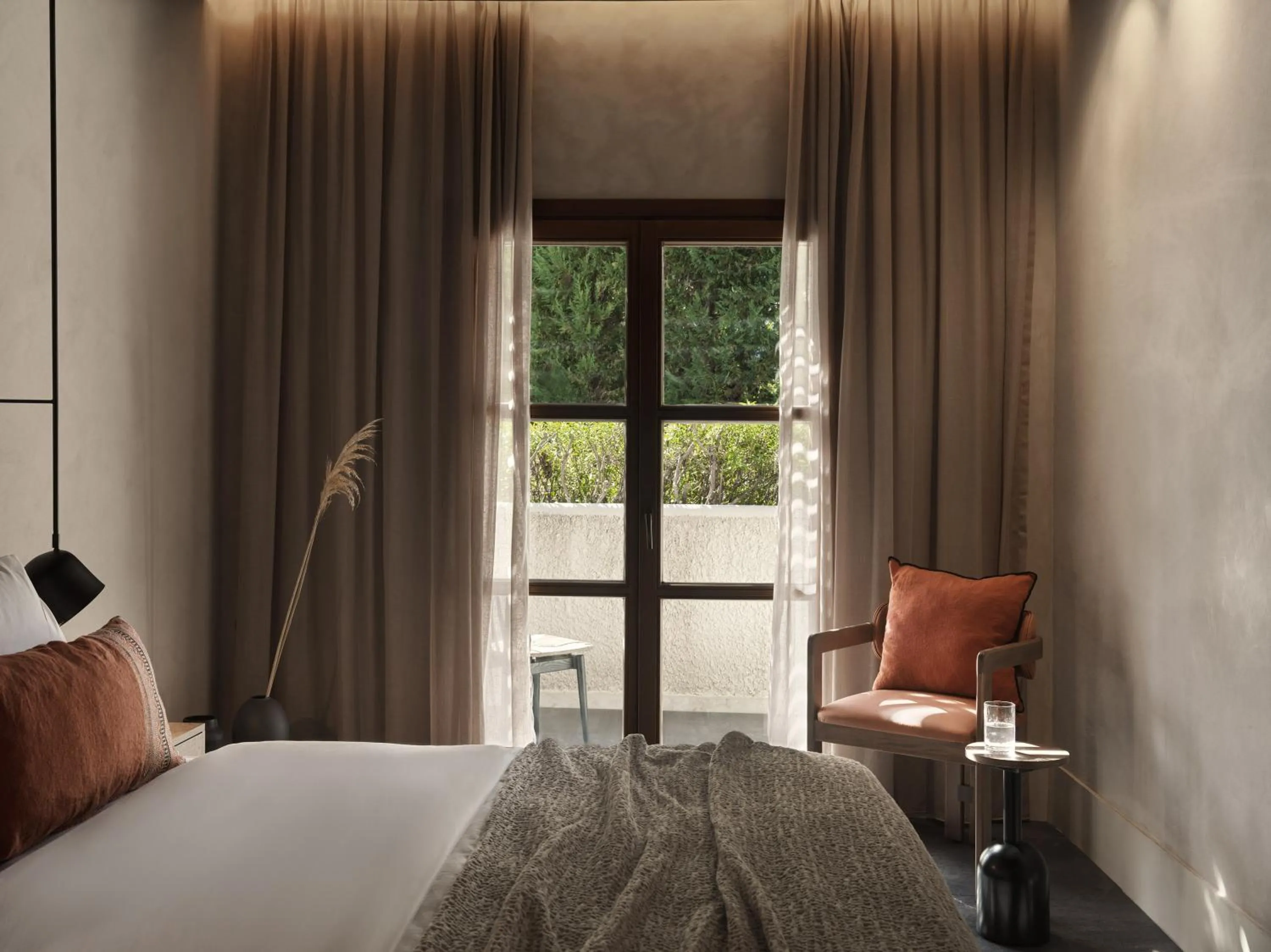 Bed in Lindian Village, Curio Collection by Hilton