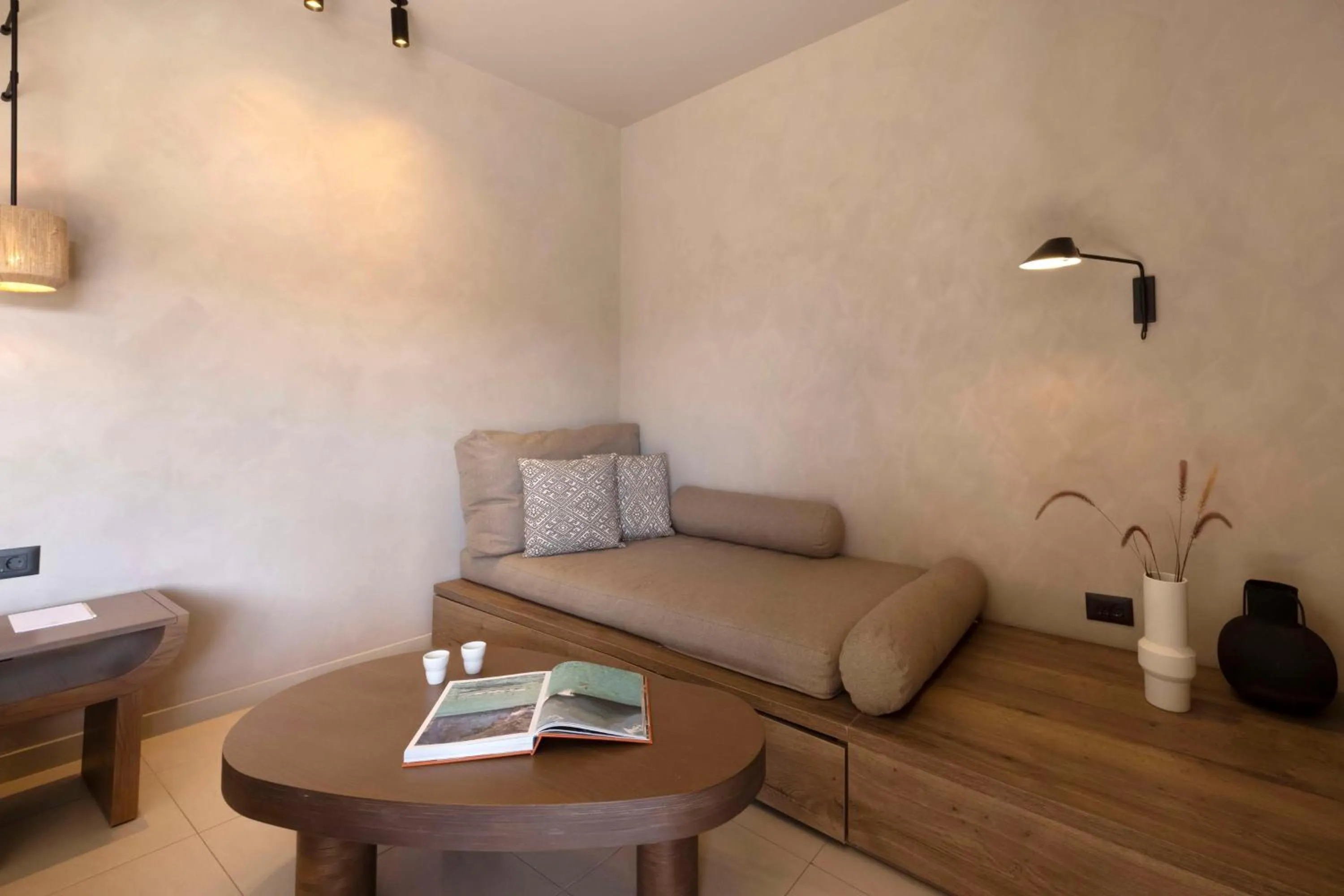 Living room in Lindian Village, Curio Collection by Hilton