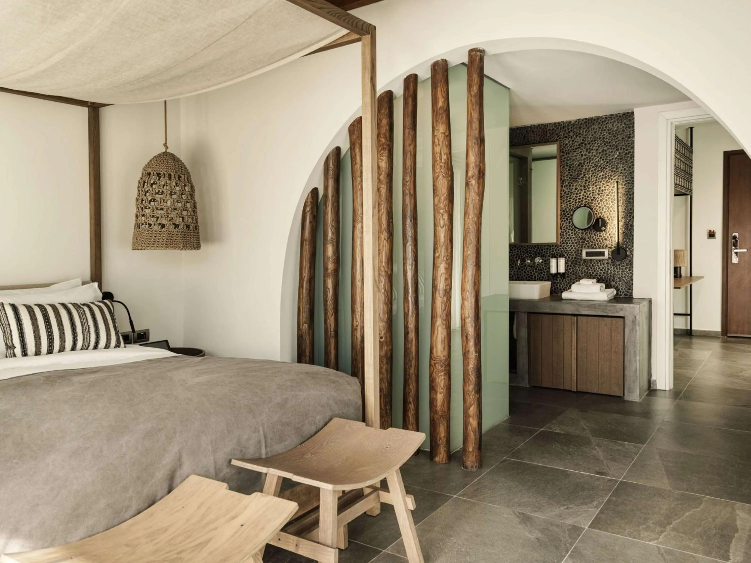 Bed in Lindian Village, Curio Collection by Hilton