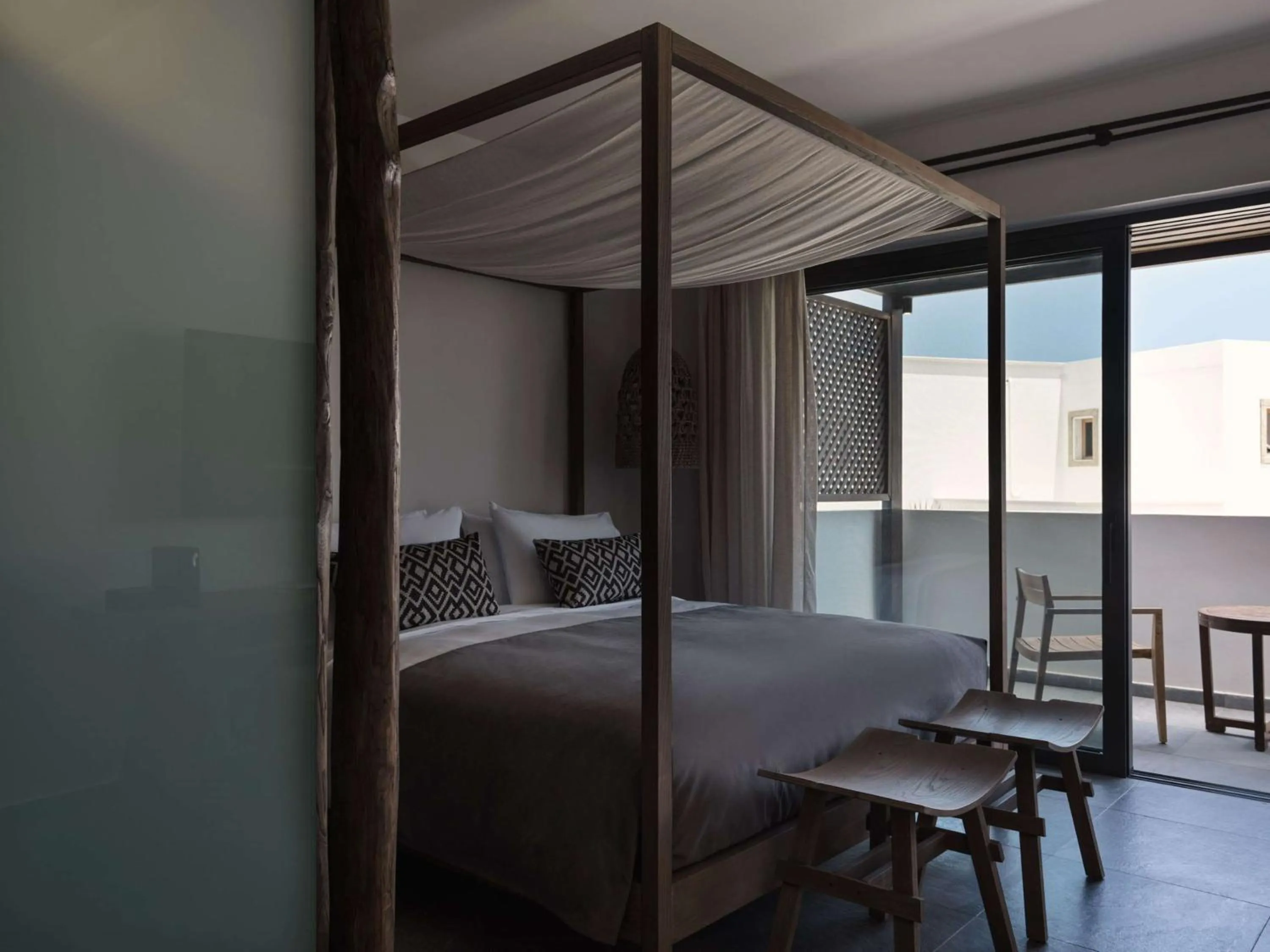 Bed in Lindian Village, Curio Collection by Hilton