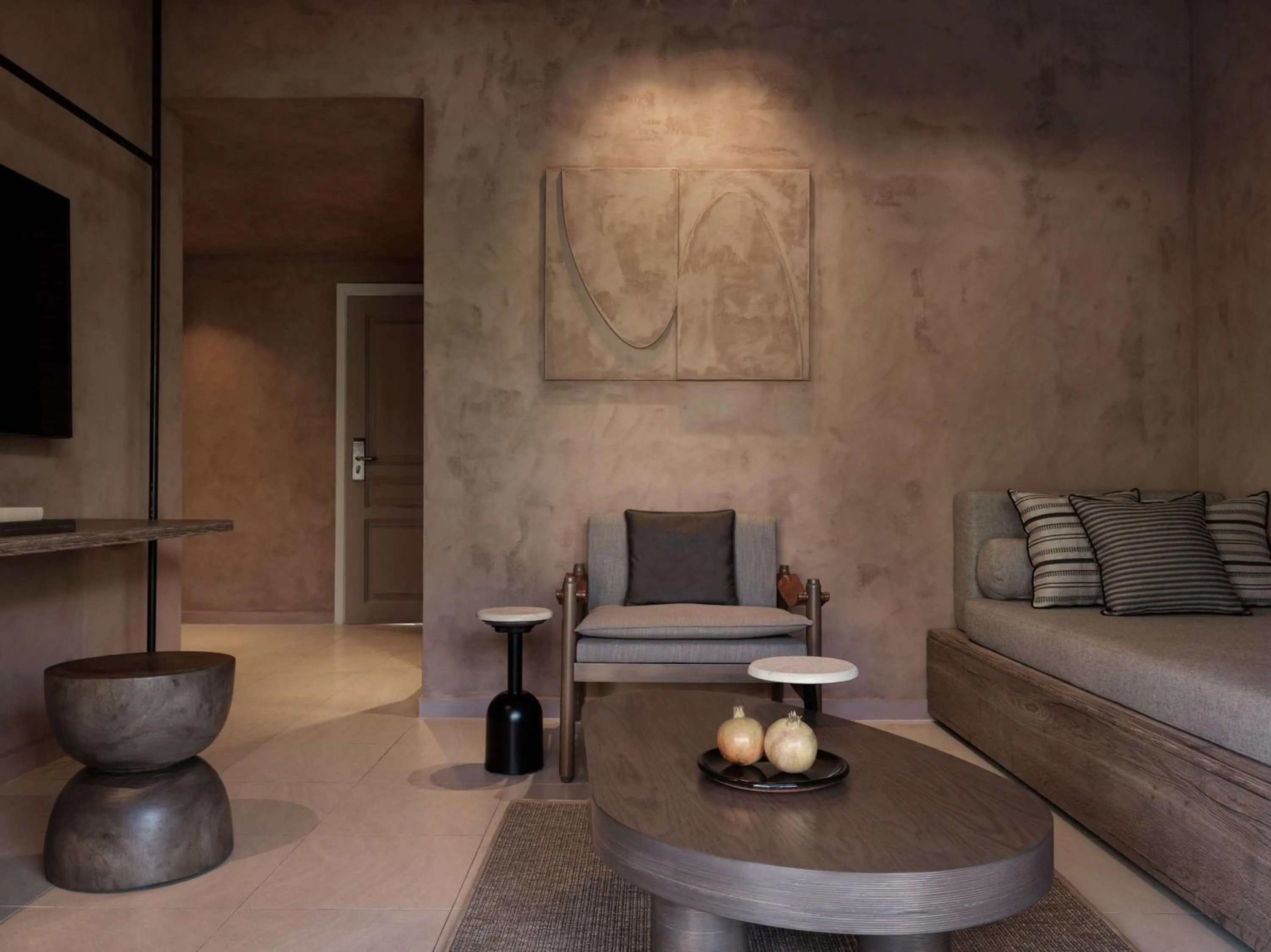 Living room in Lindian Village, Curio Collection by Hilton