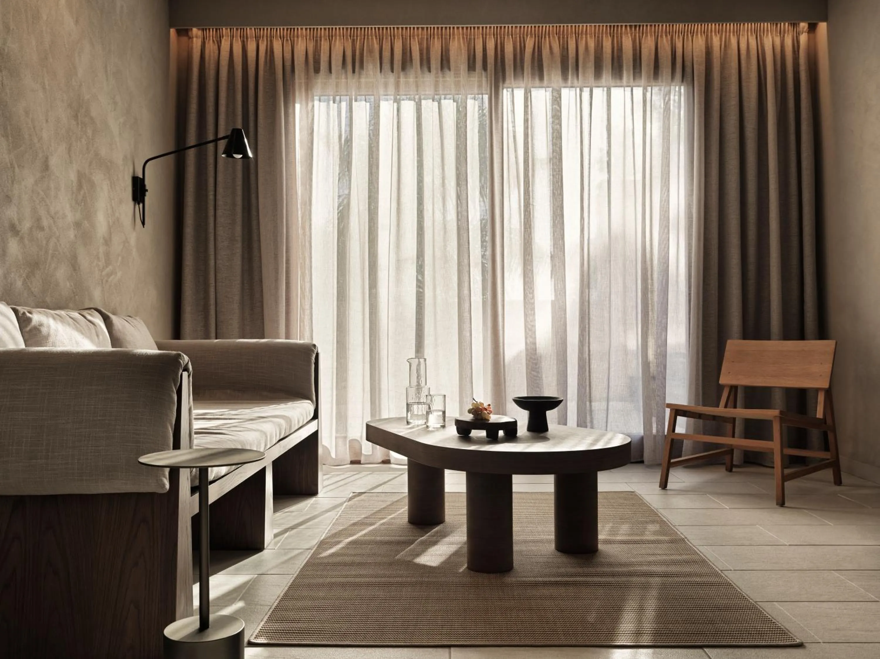 Living room in Lindian Village, Curio Collection by Hilton