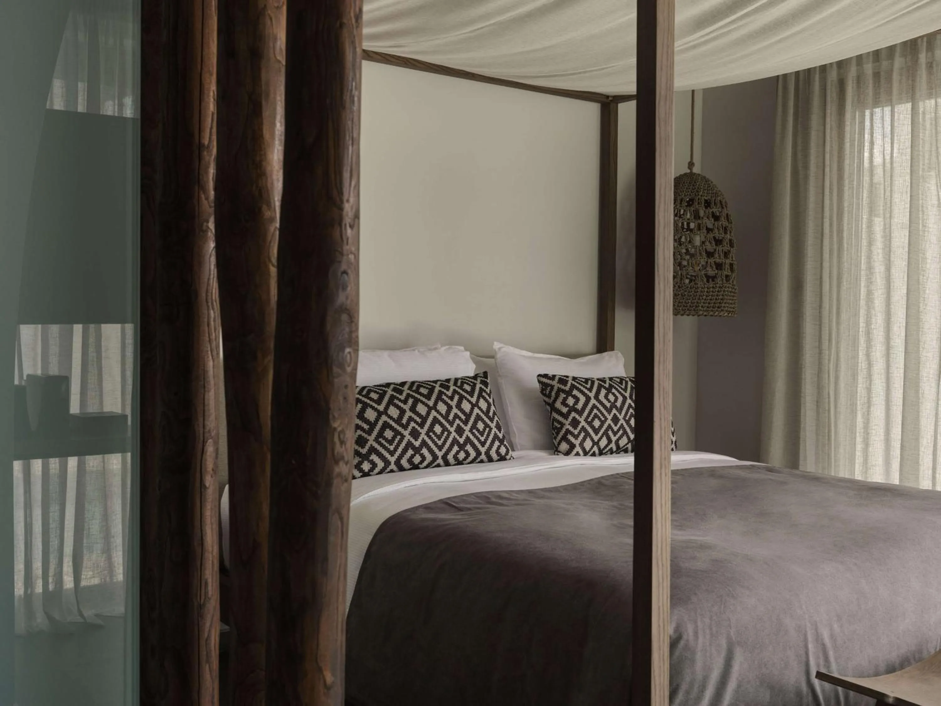 Bed in Lindian Village, Curio Collection by Hilton