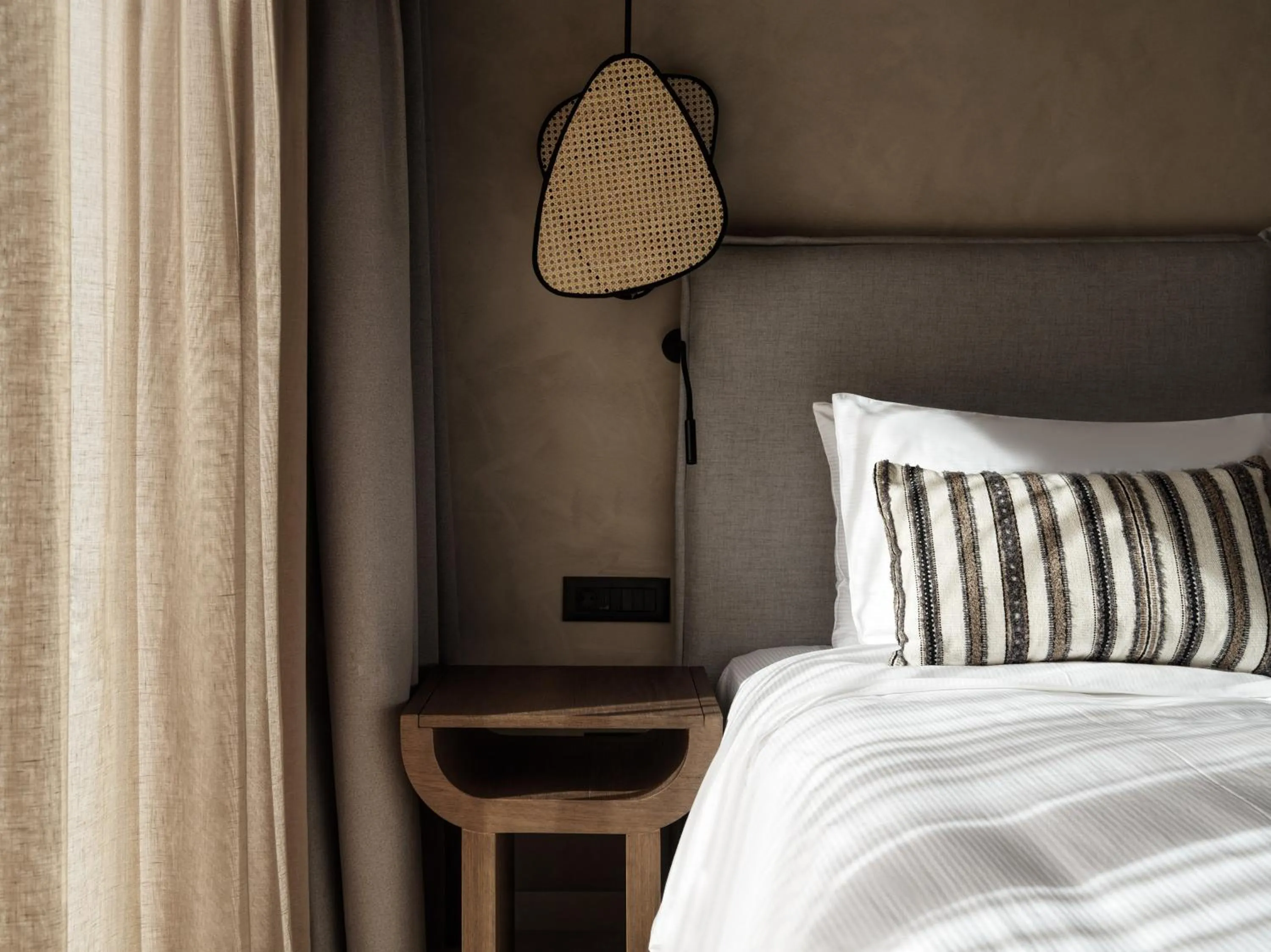 Bed in Lindian Village, Curio Collection by Hilton