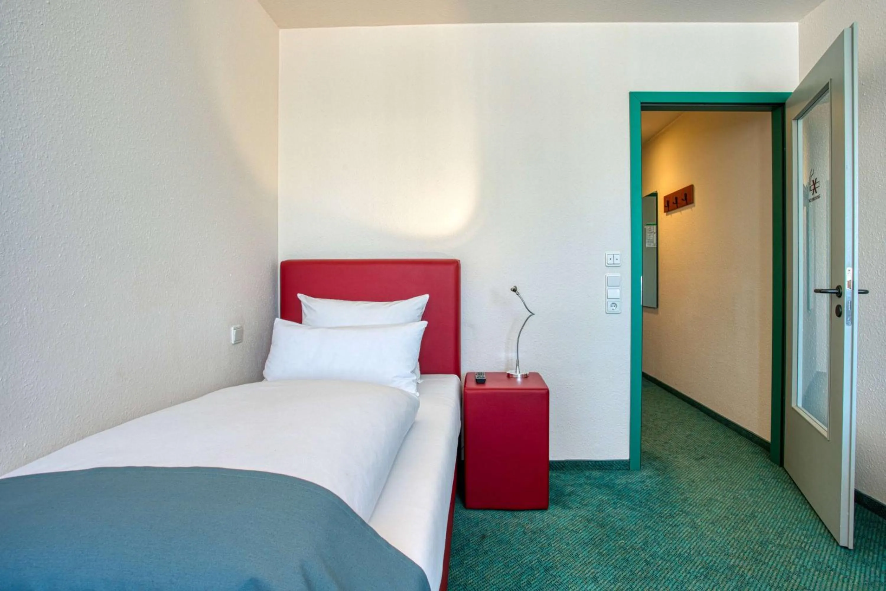 Photo of the whole room, Bed in Centro Hotel Böblingen, Trademark Collection by Wyndham