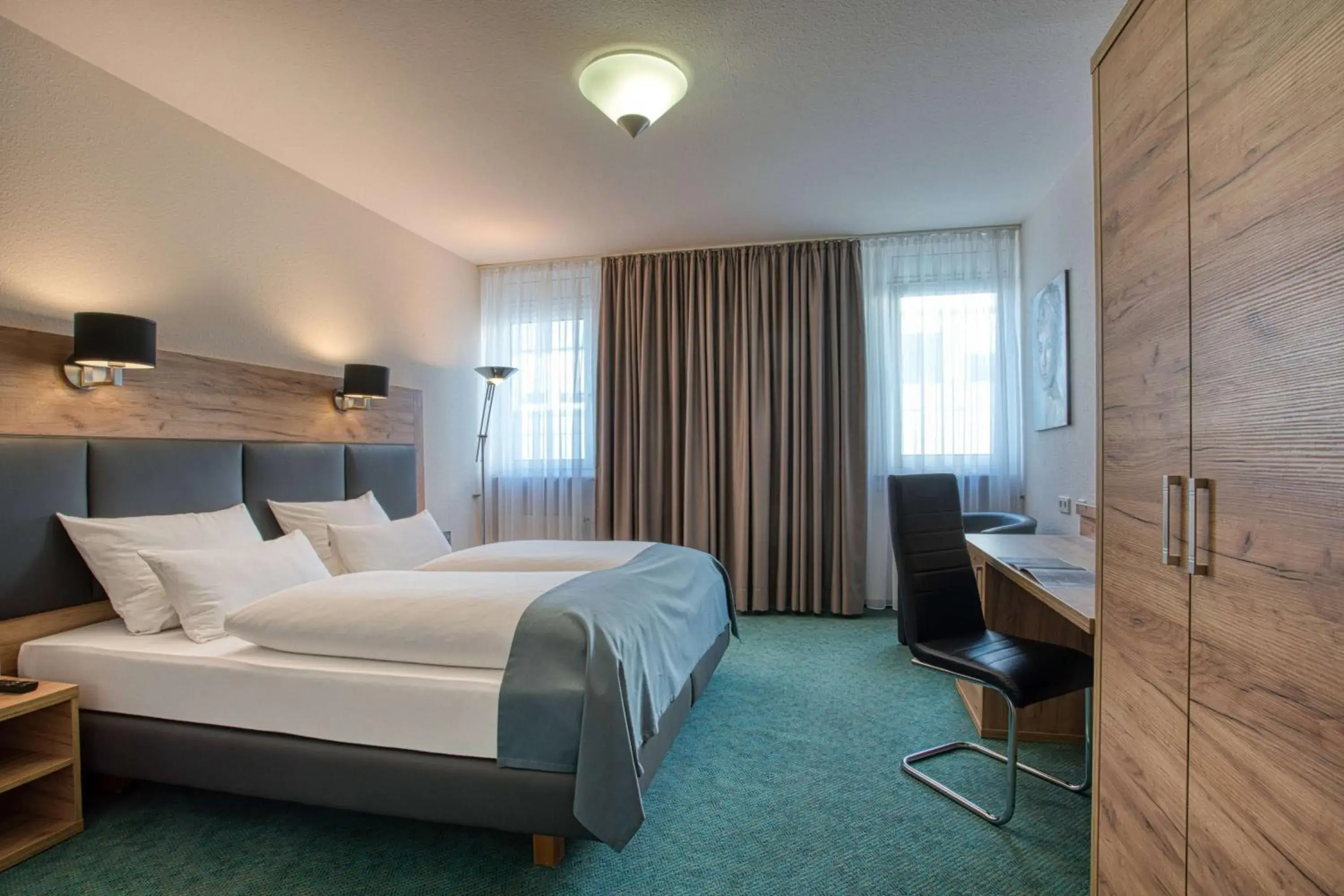 Photo of the whole room, Bed in Centro Hotel Böblingen, Trademark Collection by Wyndham Photo of the whole room, Bed in Centro Hotel Böblingen, Trademark Collection by Wyndham
