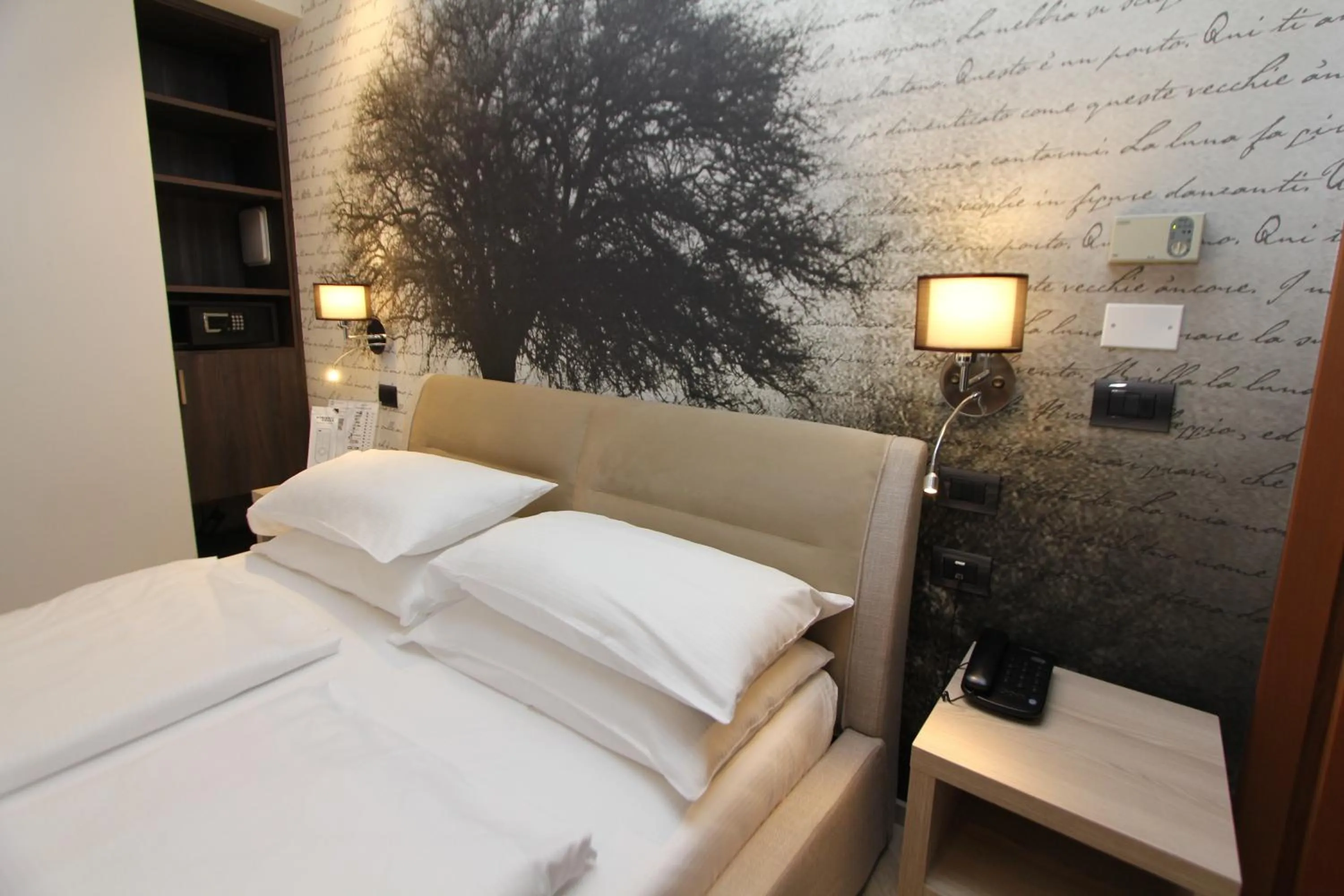 Bed in Hotel Villa Rosa