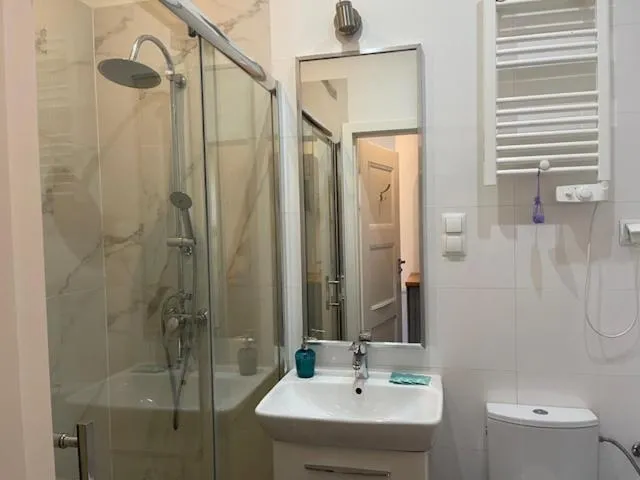 Shower in Angel House Aparthotel