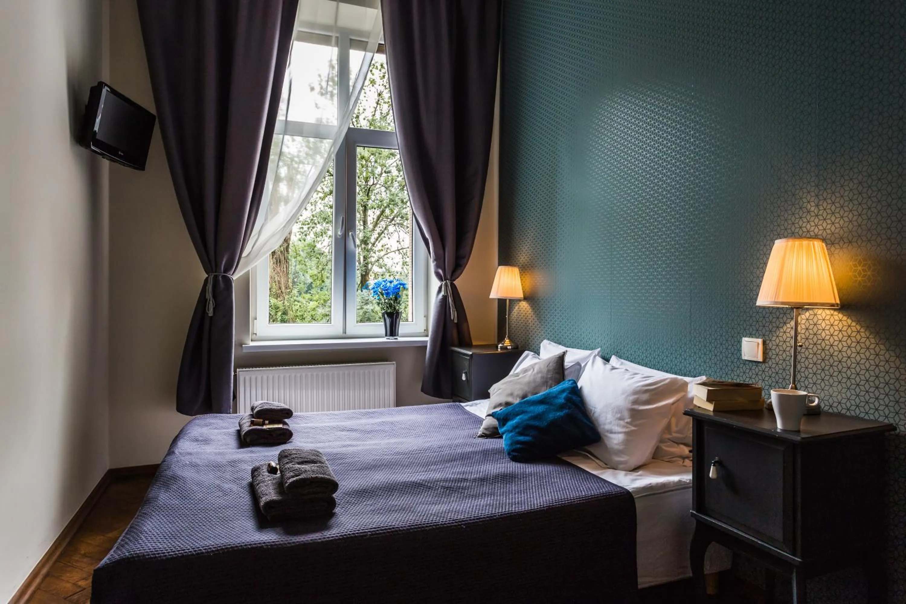 Bed in Angel House Aparthotel