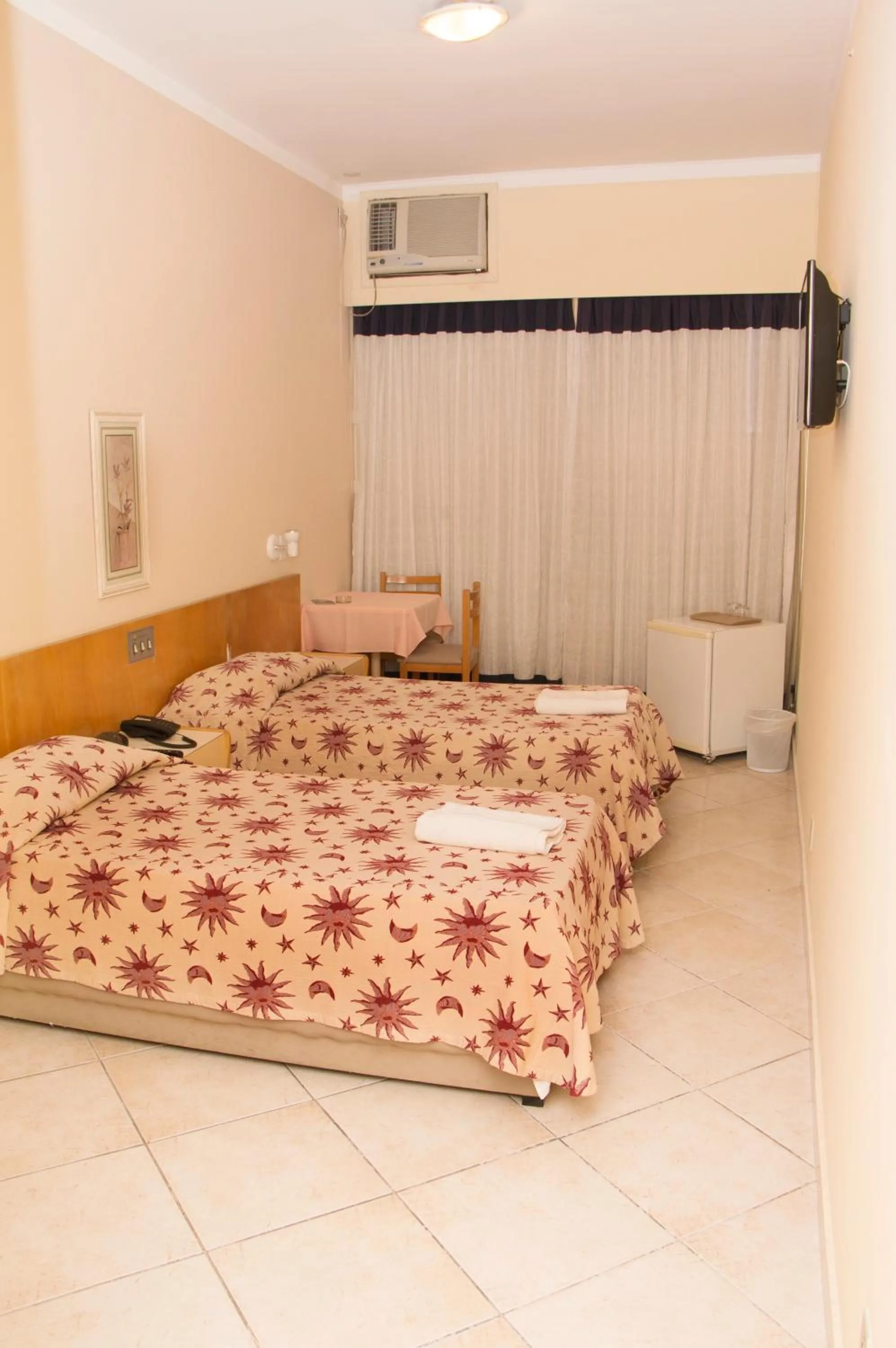 Bed in Hotel Pouso Real