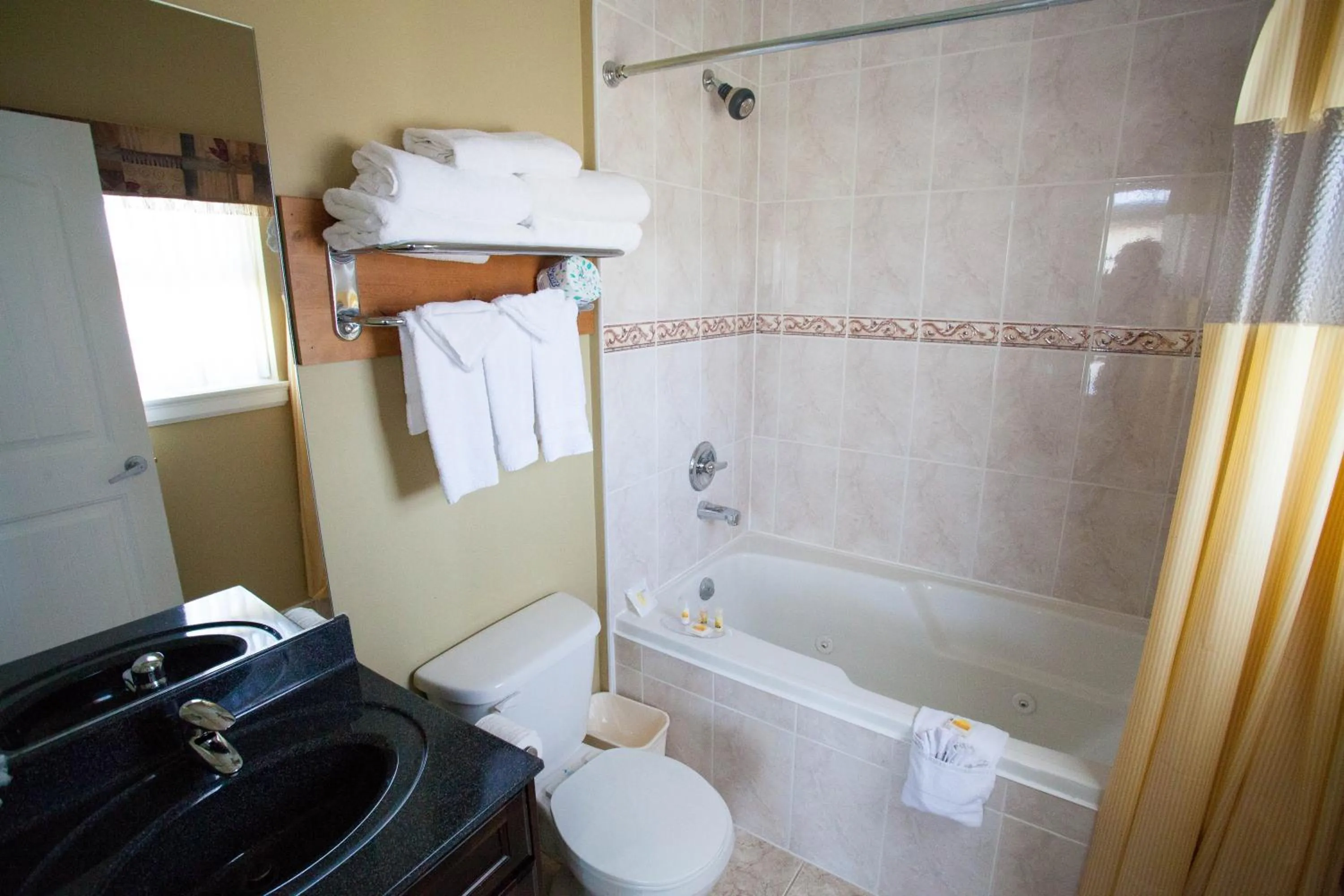 Bathroom in Days Inn by Wyndham Surrey