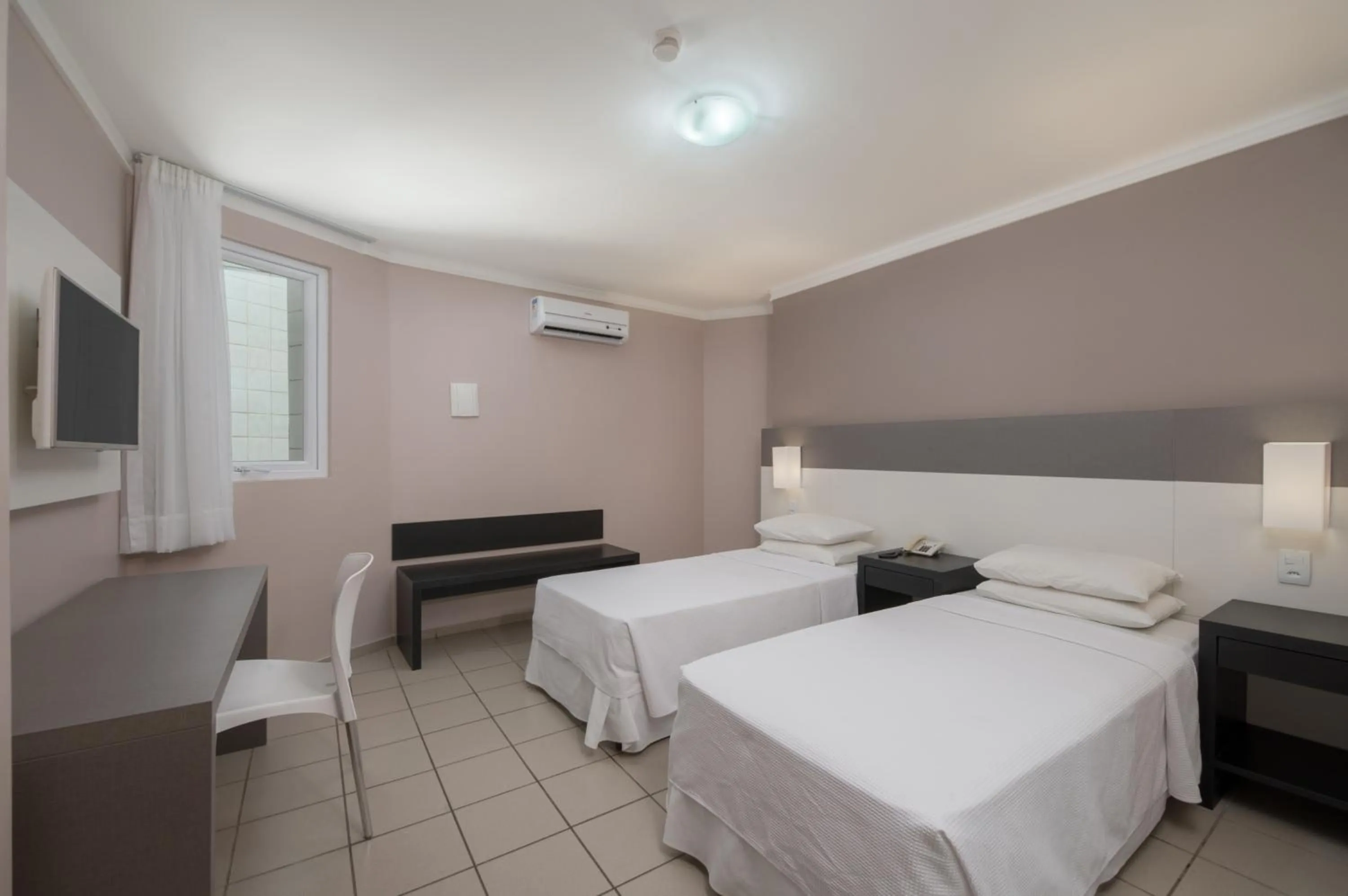 Bed in Hotel Sete Coqueiros