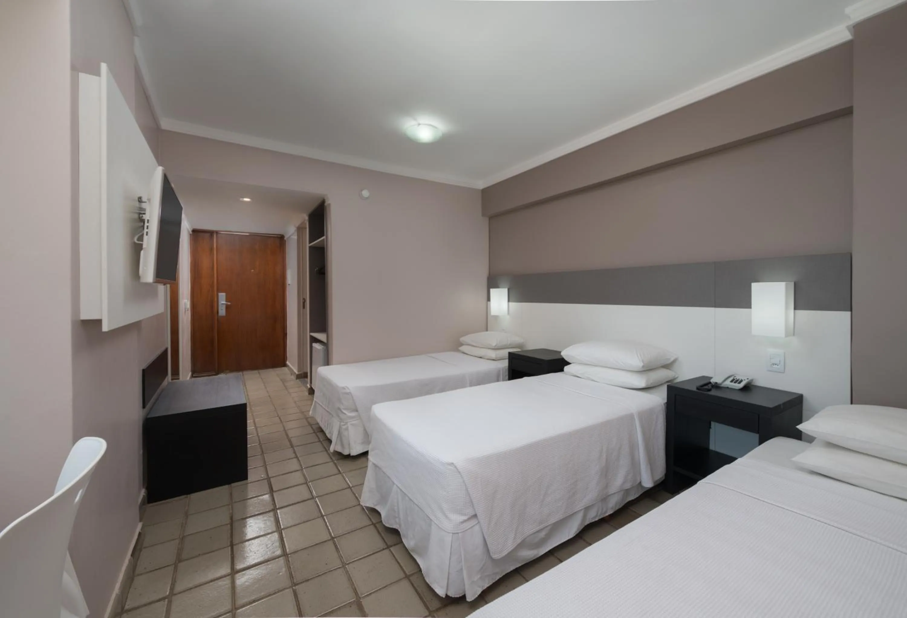 Bed in Hotel Sete Coqueiros