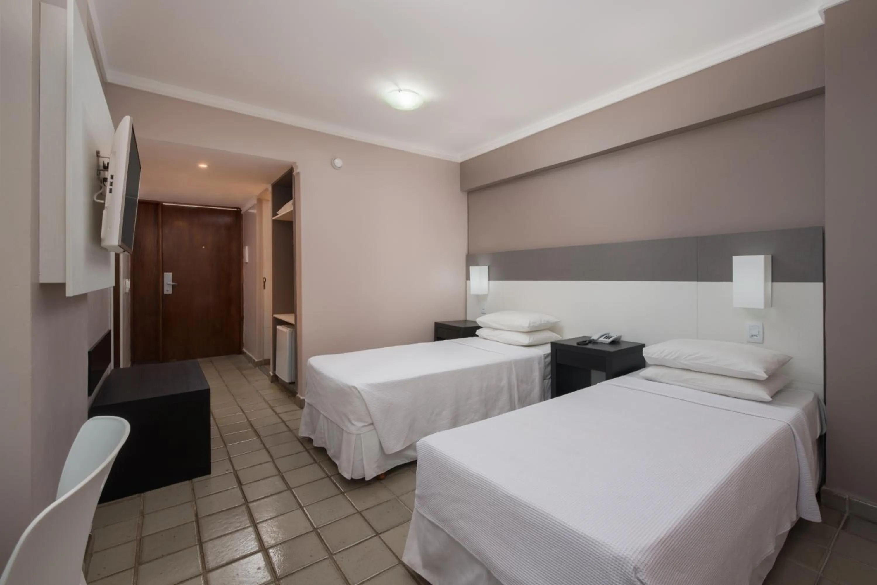 Bed in Hotel Sete Coqueiros