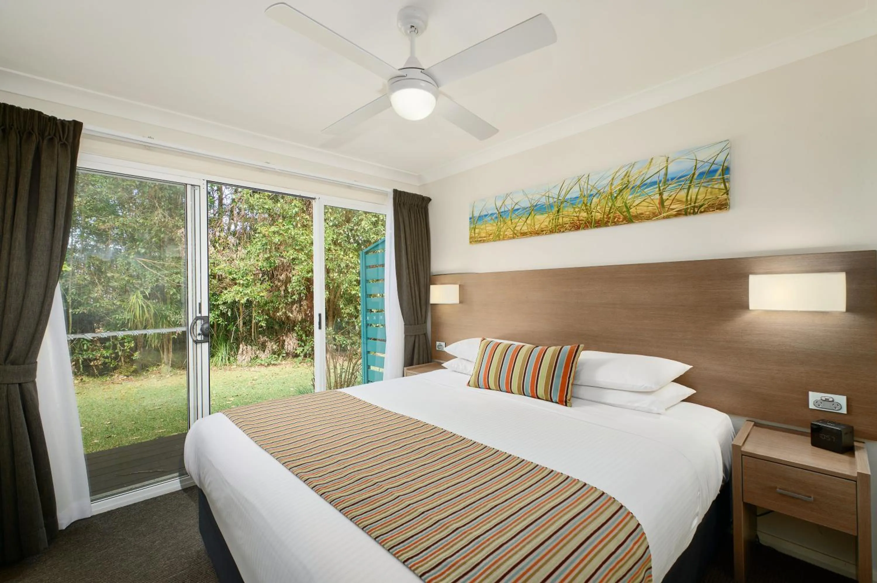 Bedroom, Bed in Flynns on Surf Beach Villas