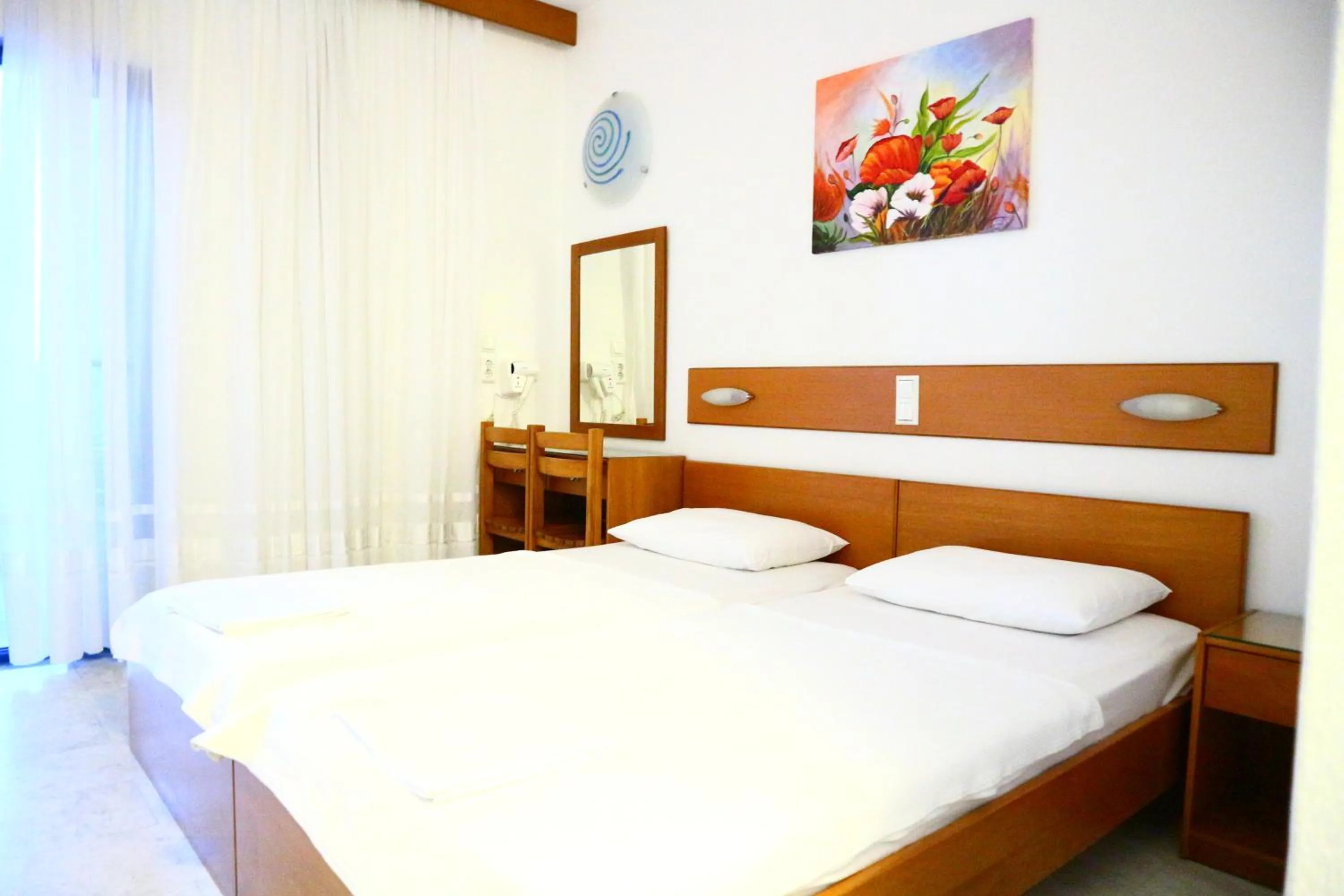 Bed in Danae Hotel