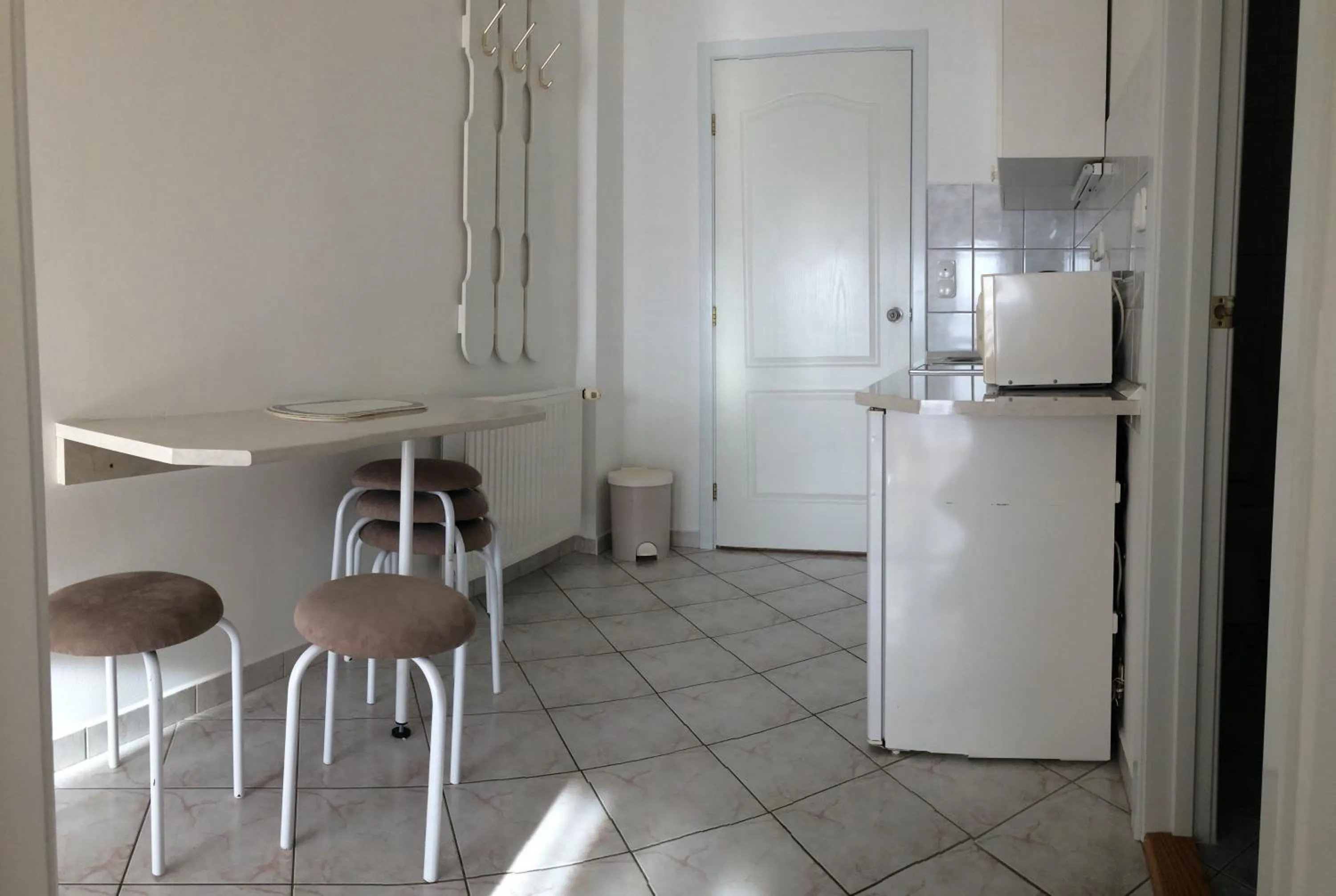 Kitchen or kitchenette in Szalóky Apartmanház
