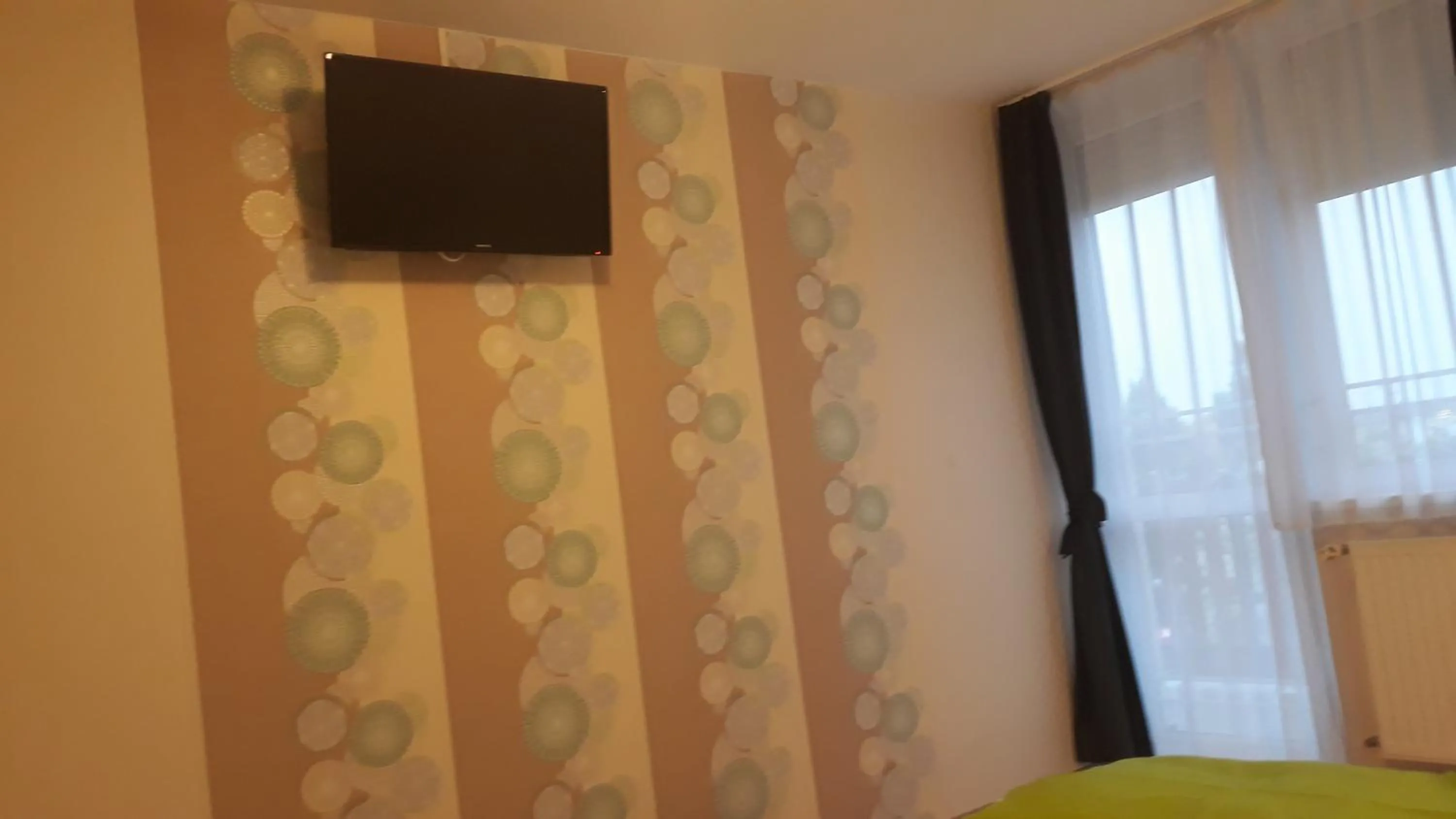 Bedroom in Szalóky Apartmanház