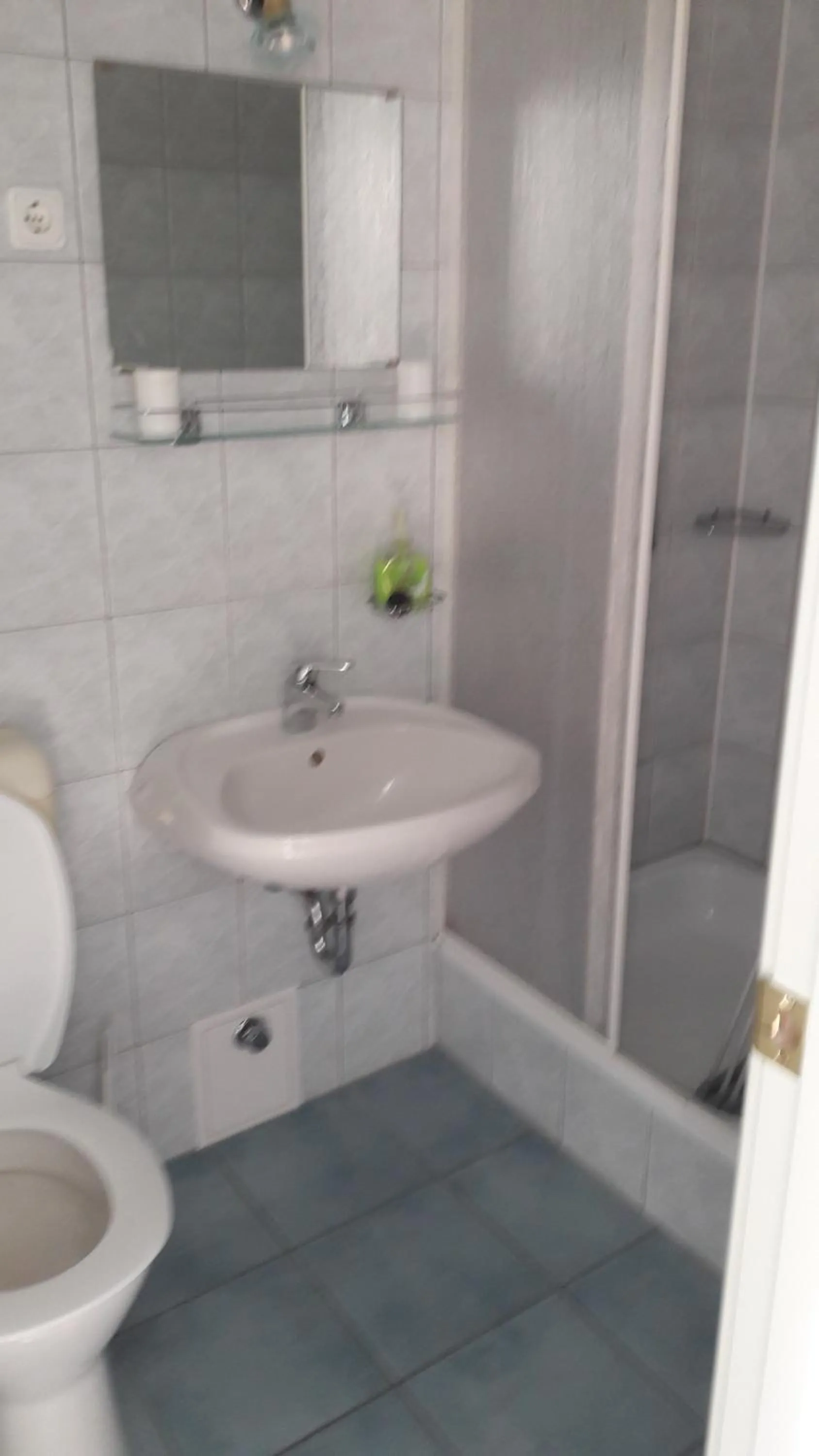 Bathroom in Szalóky Apartmanház