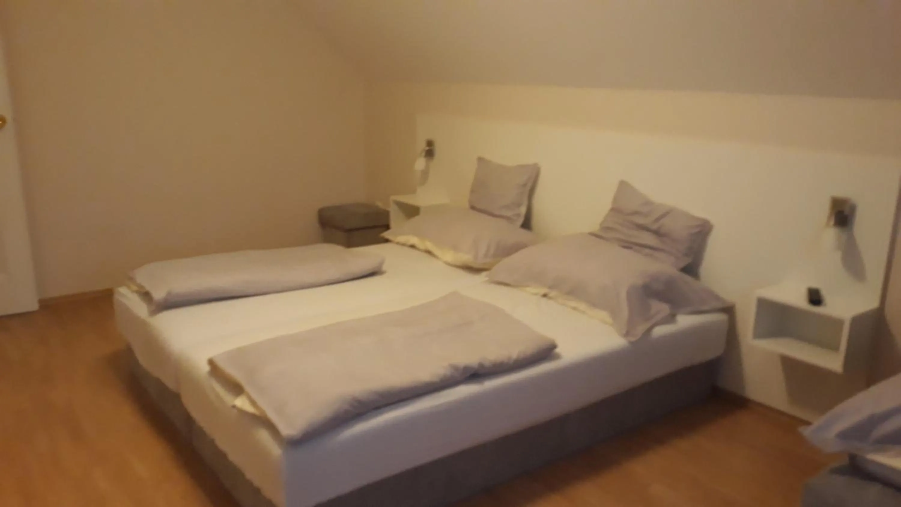 Bed in Szalóky Apartmanház