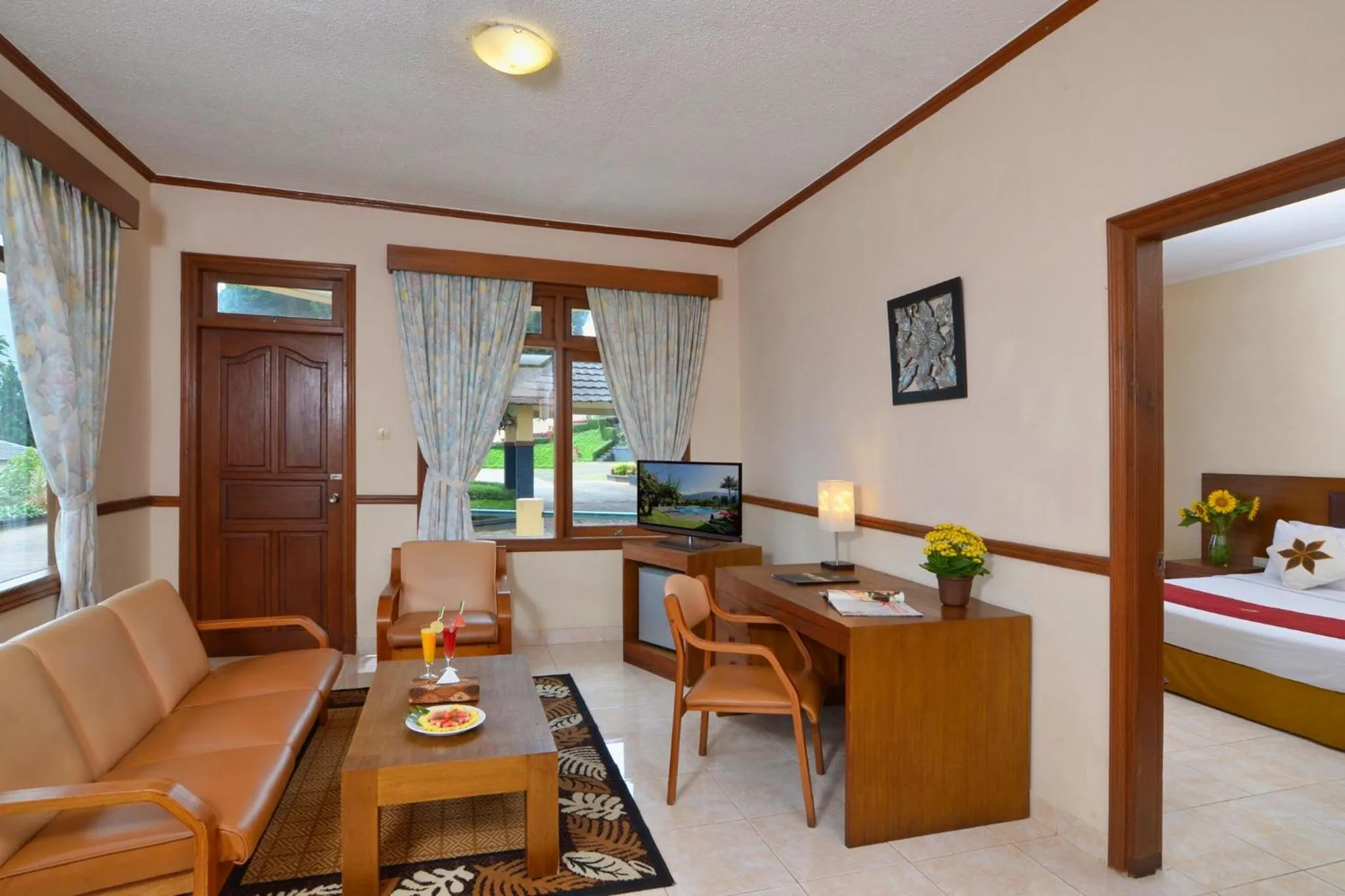 Seating area, Bed in The Jayakarta Cisarua