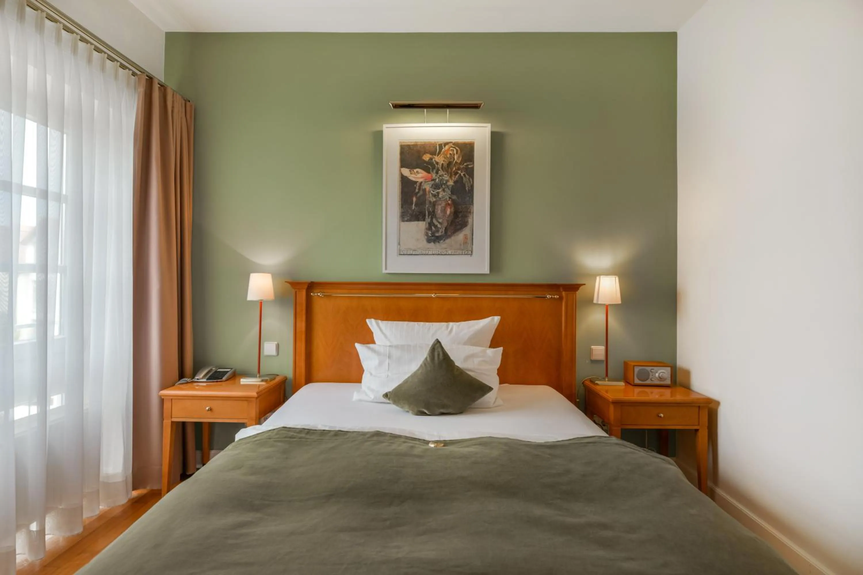 Bed in Romantik Hotel Kleber Post