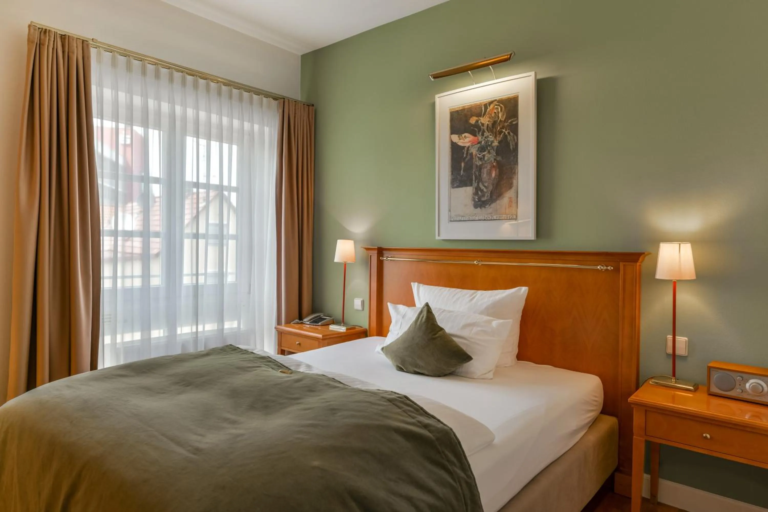 Bed in Romantik Hotel Kleber Post