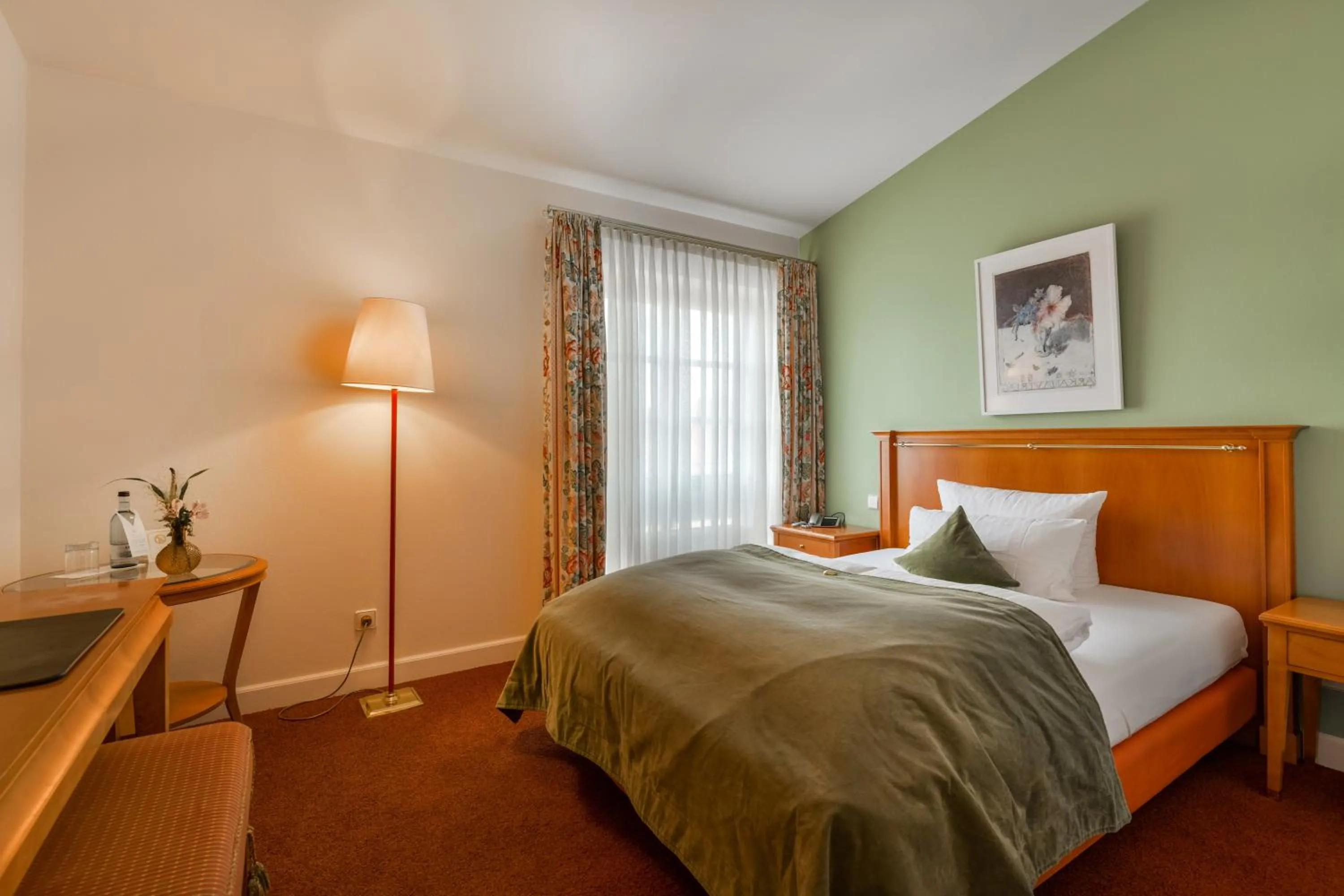 Bed in Romantik Hotel Kleber Post