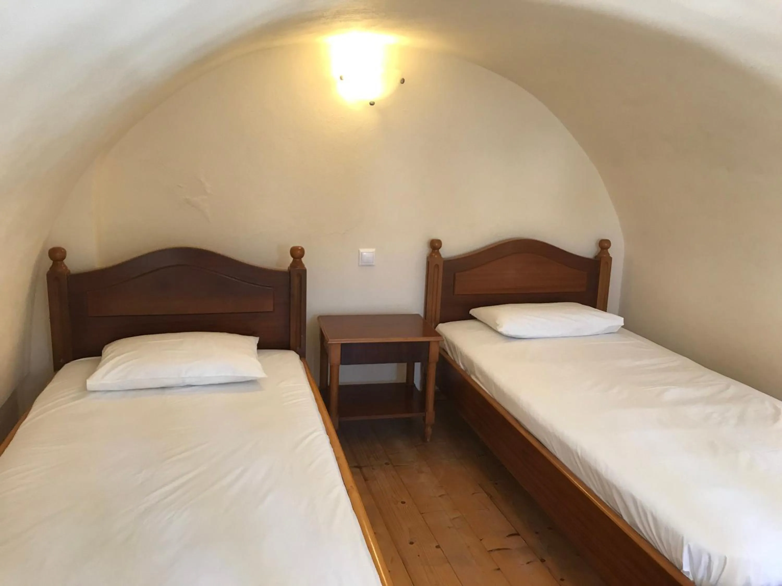 Bed in Ifestia Hotel