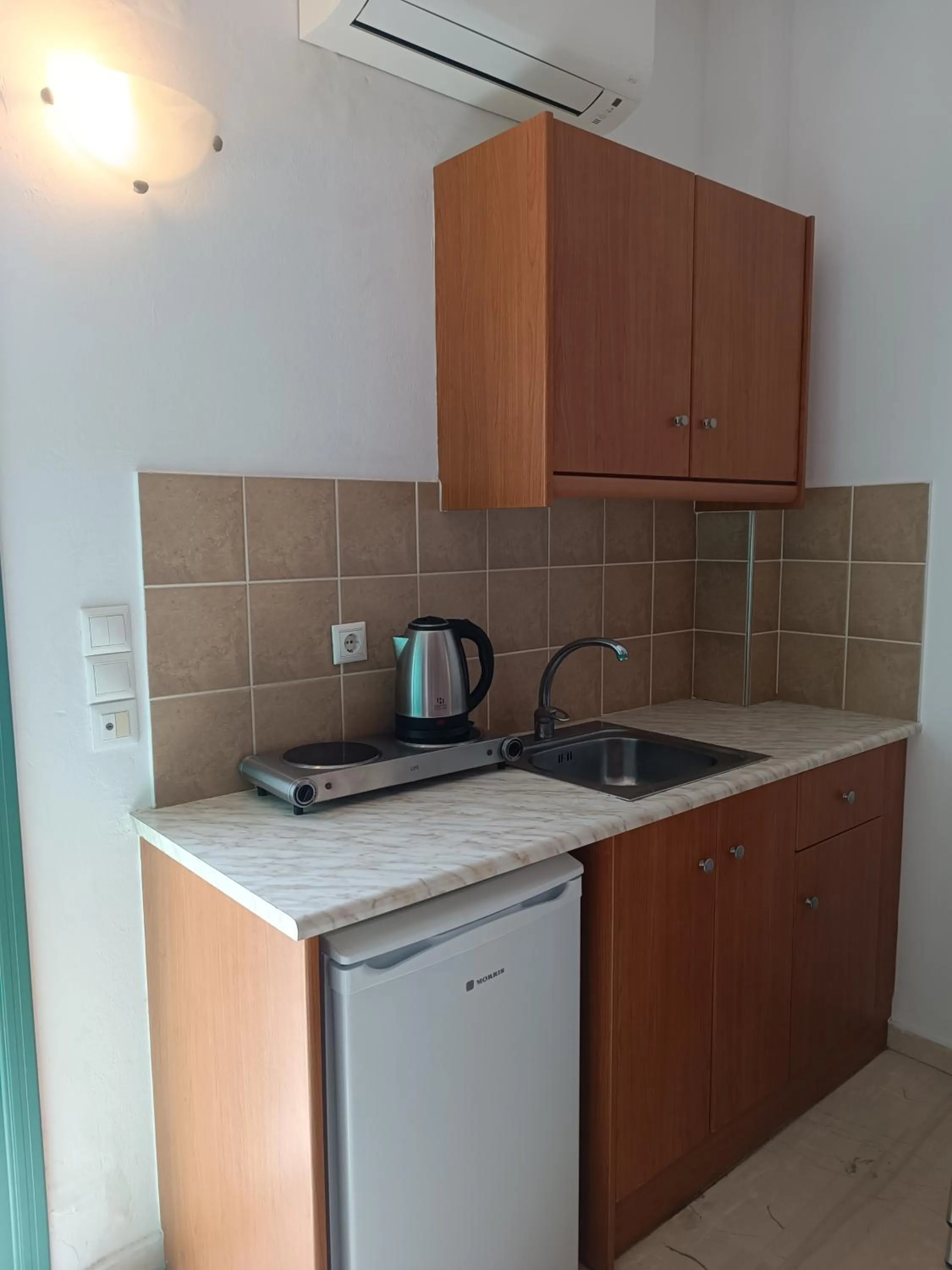 Kitchen or kitchenette in Ifestia Hotel