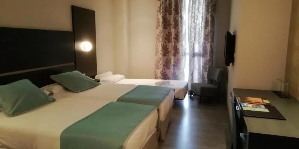 Bed in Hotel Ciudad de Ponferrada, Ascend Hotel Collection