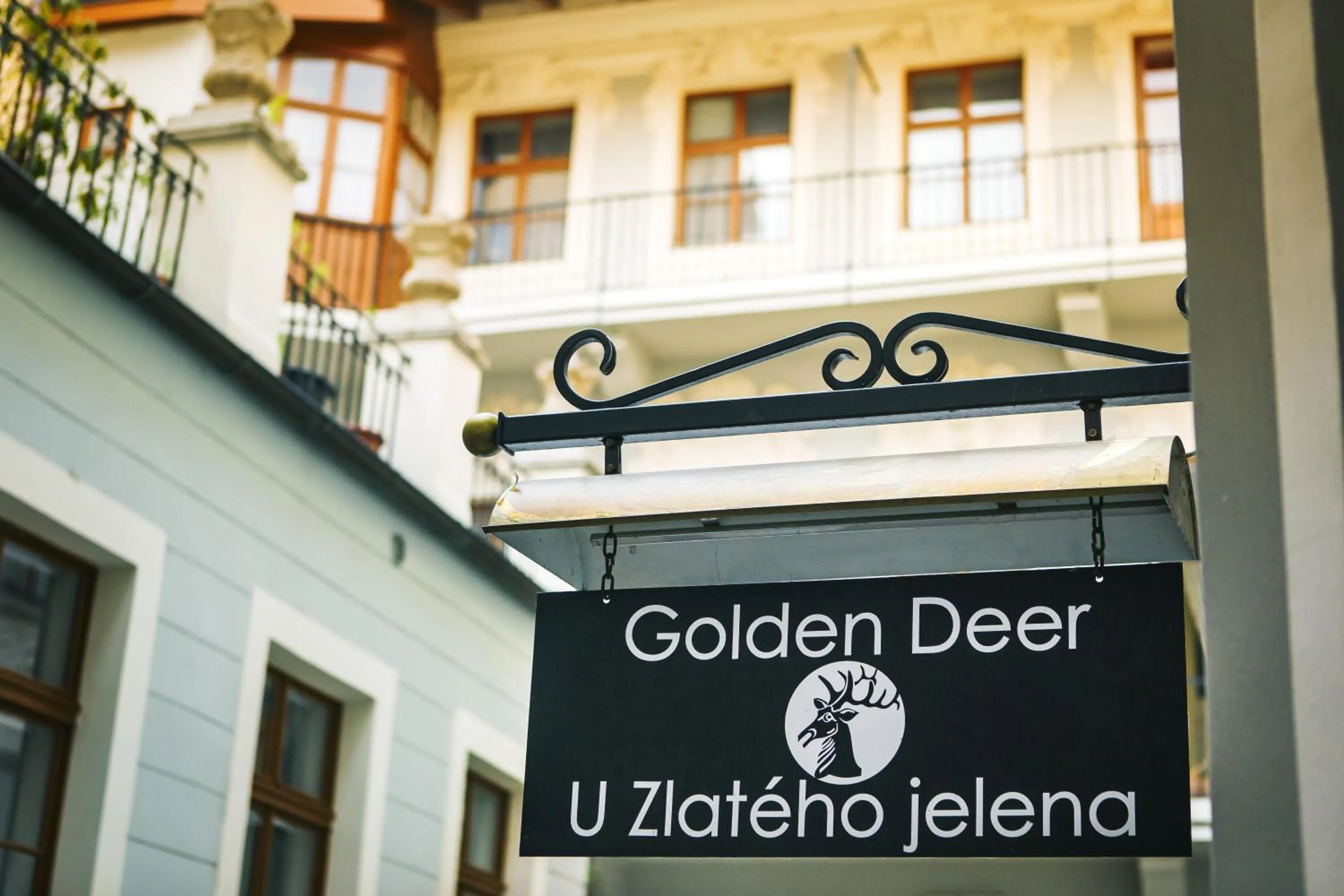 Property logo or sign in Hotel U Zlateho jelena