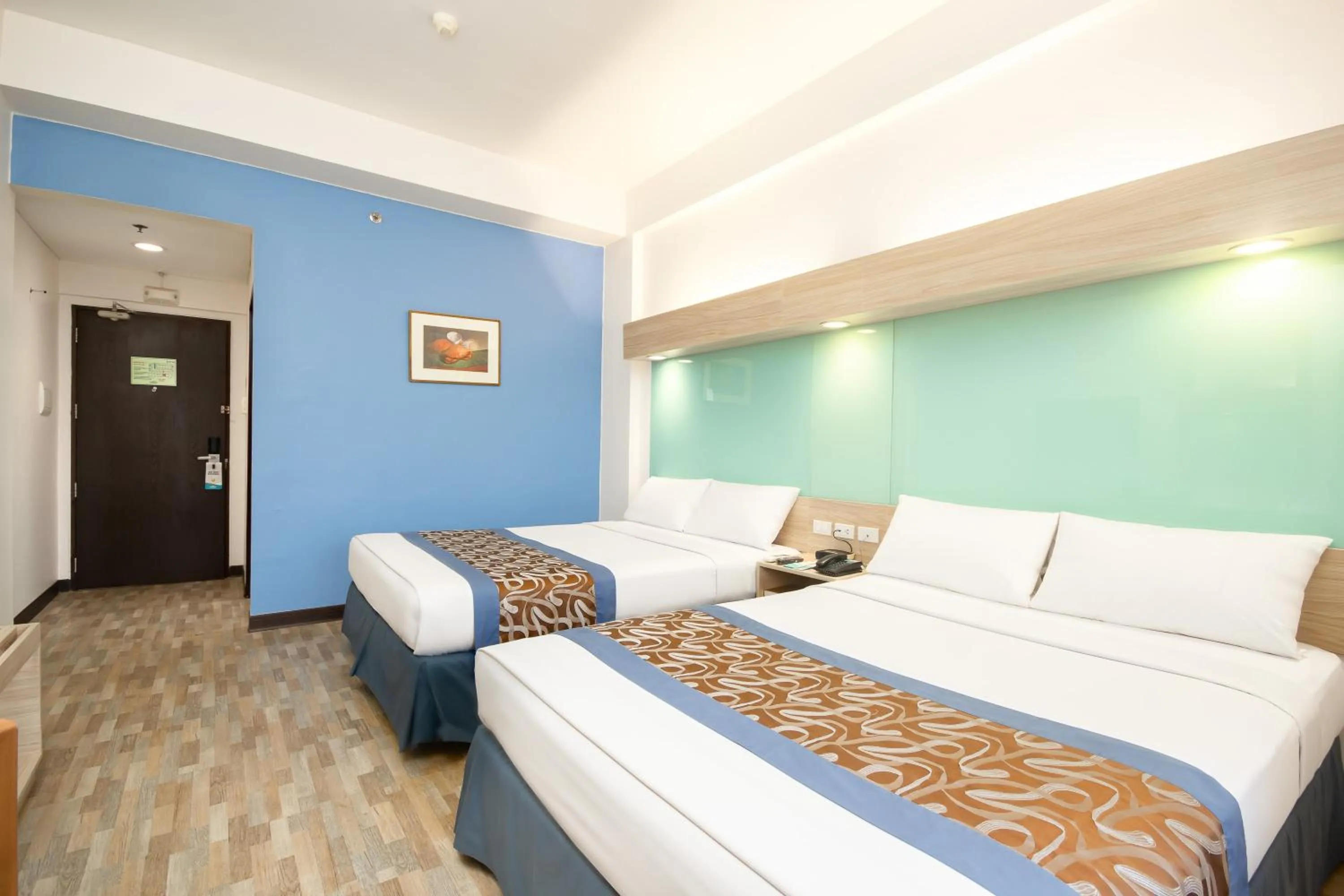 Photo of the whole room, Bed in Microtel by Wyndham Mall of Asia