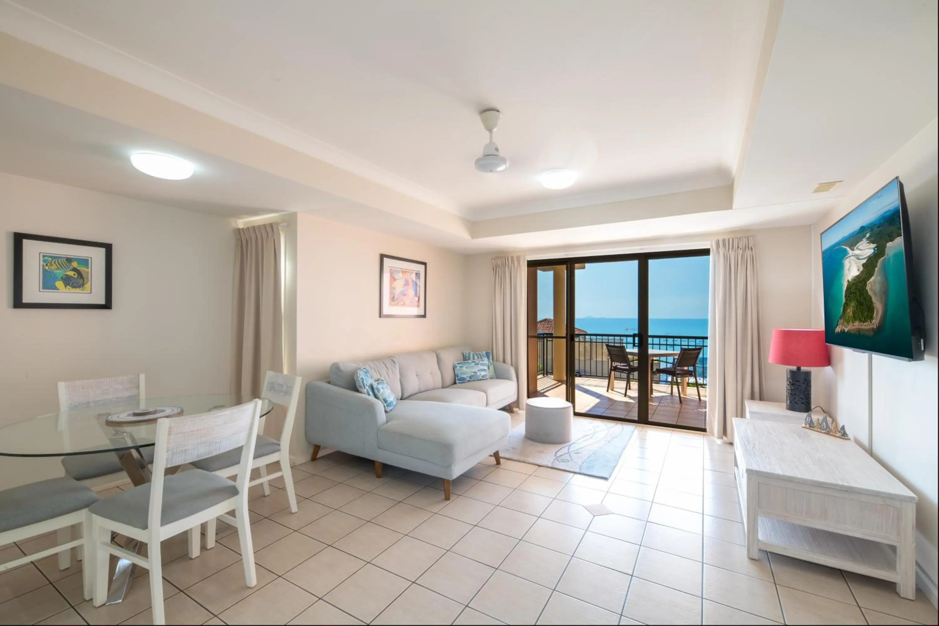 Living room, Bed in Martinique Whitsunday Resort
