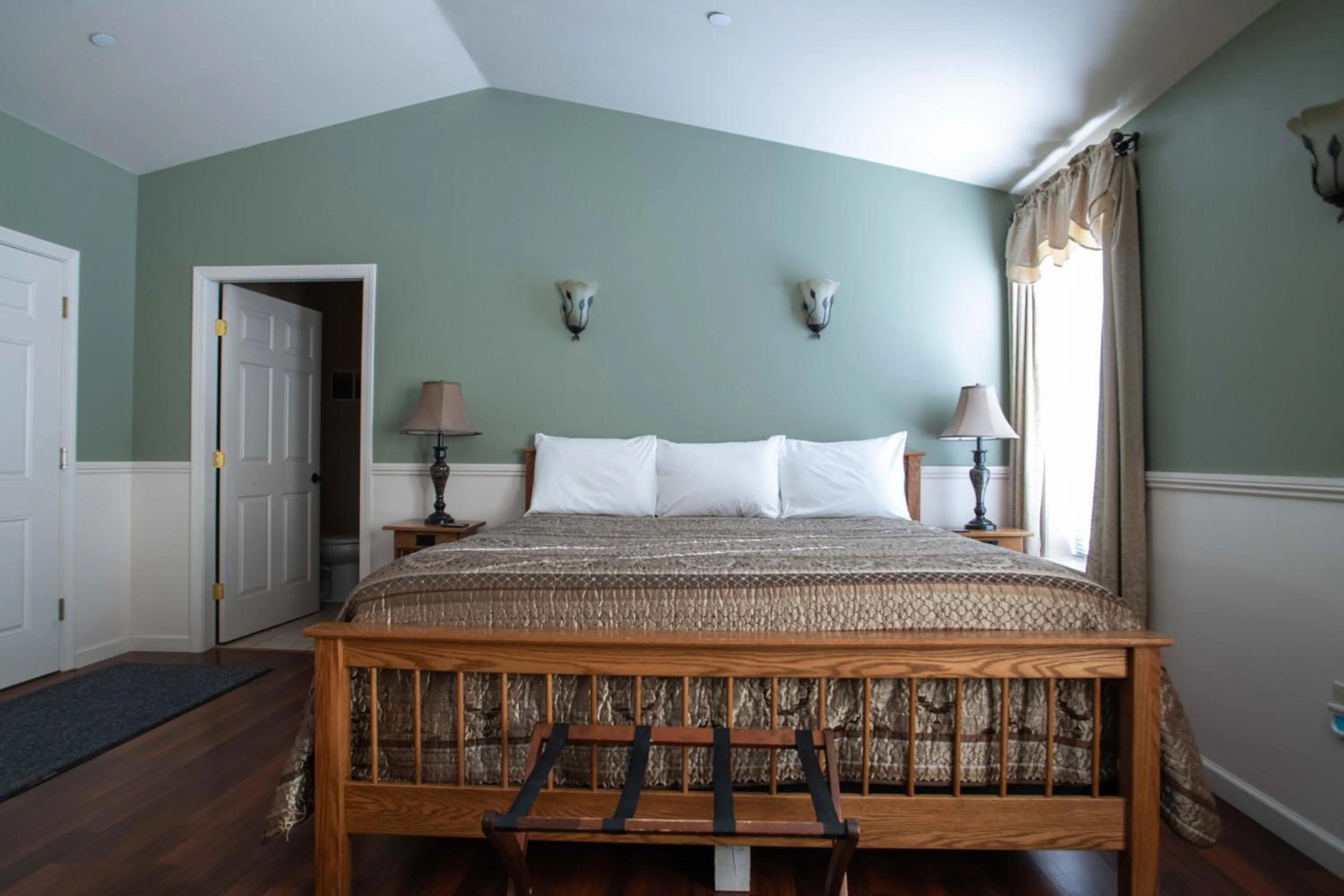 Bed in Swift River Suites