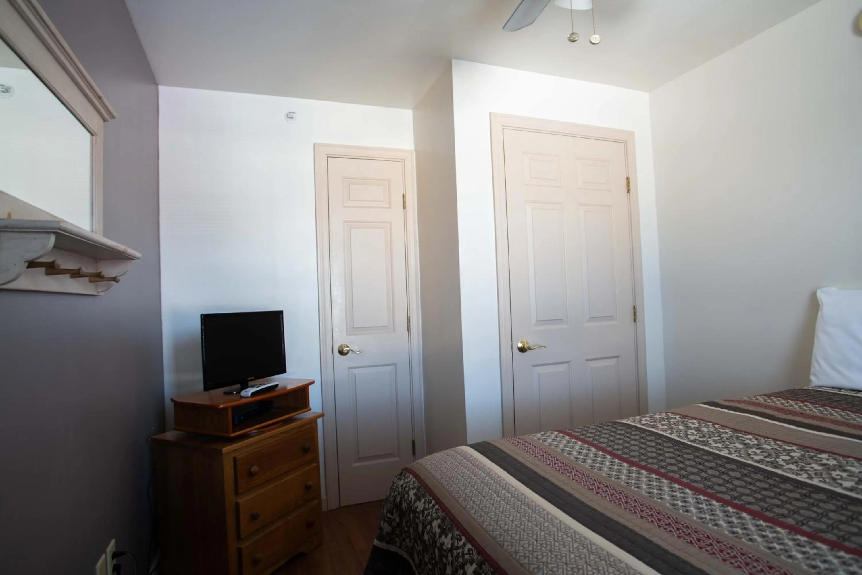 Bed in Swift River Suites