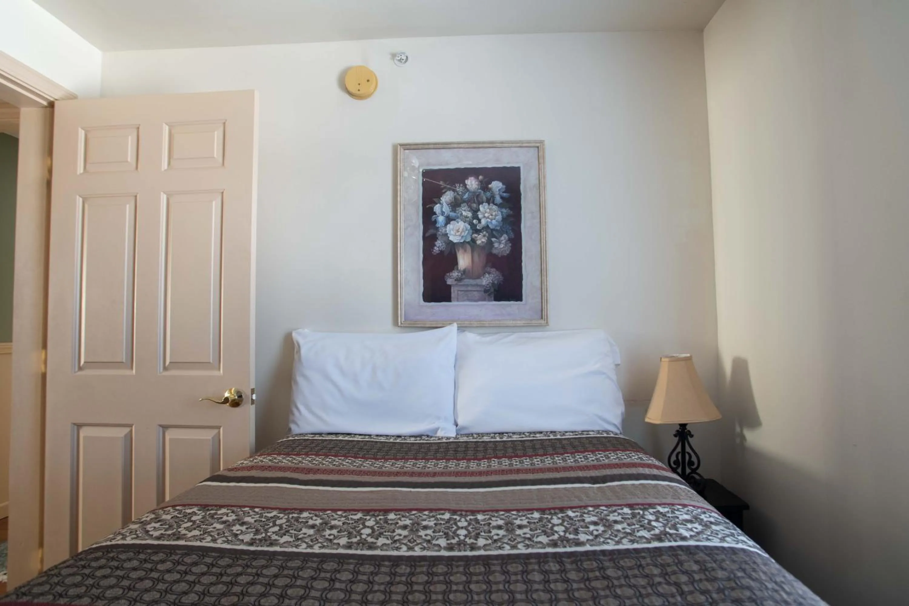 Bed in Swift River Suites