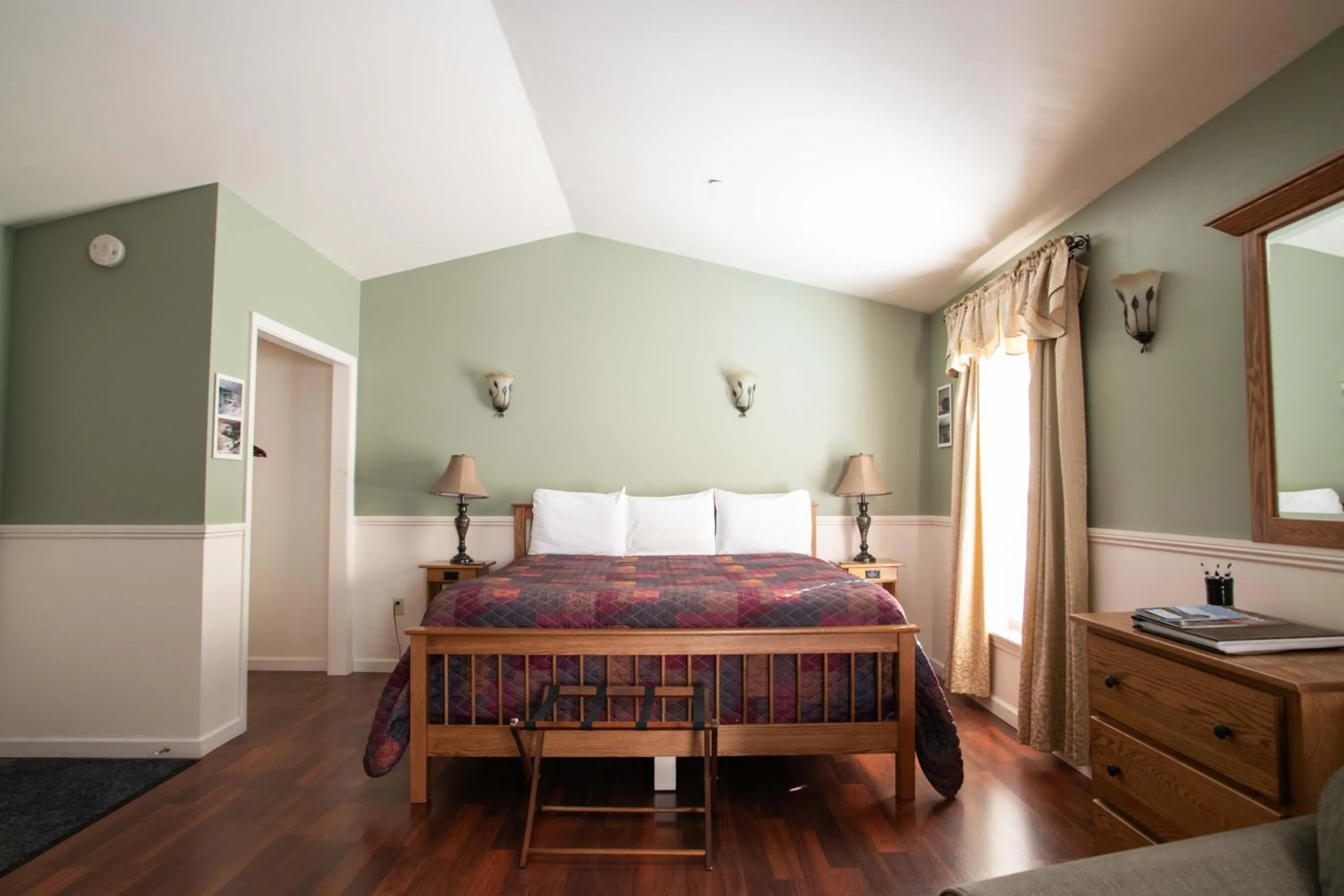 Bed in Swift River Suites