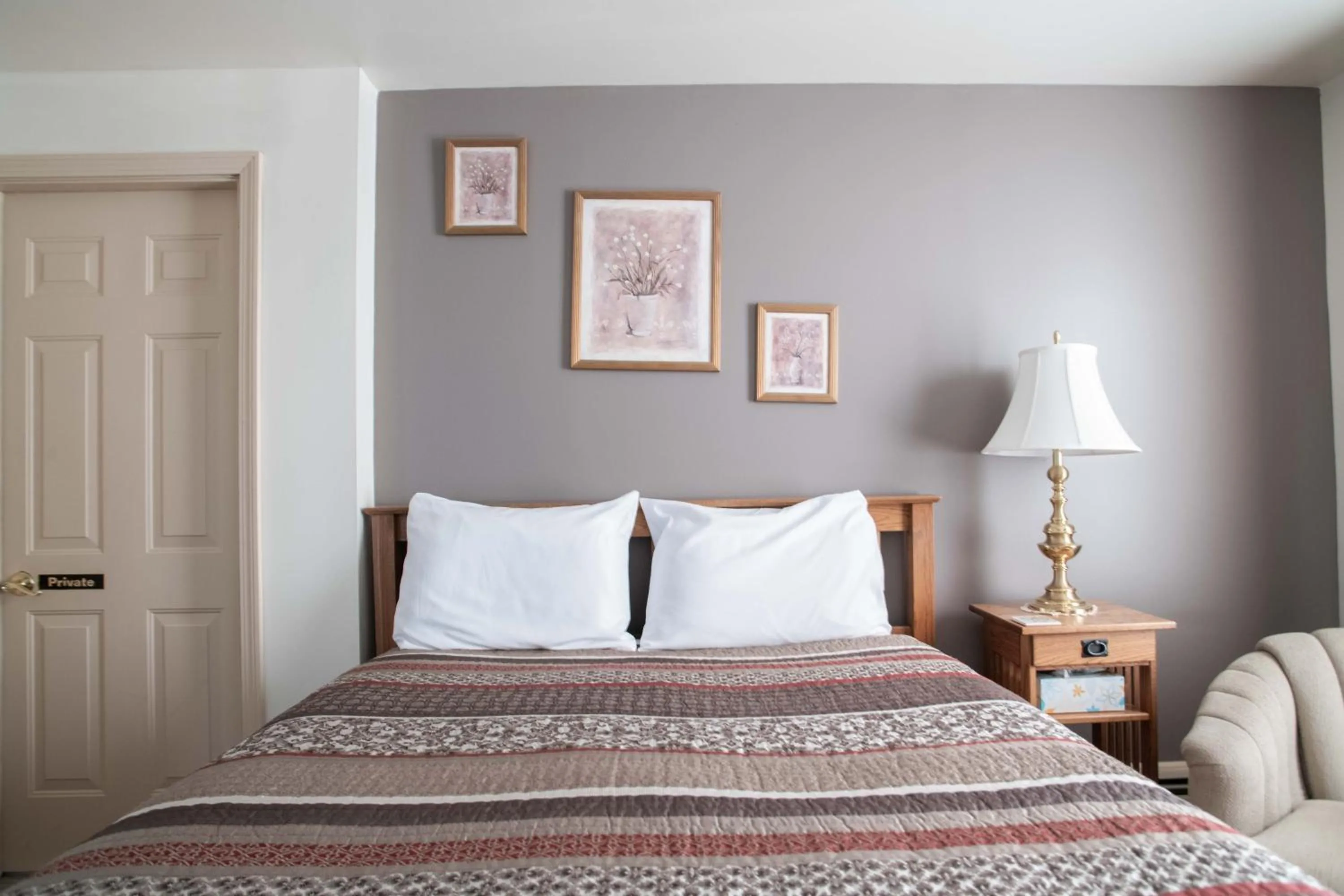 Bed in Swift River Suites