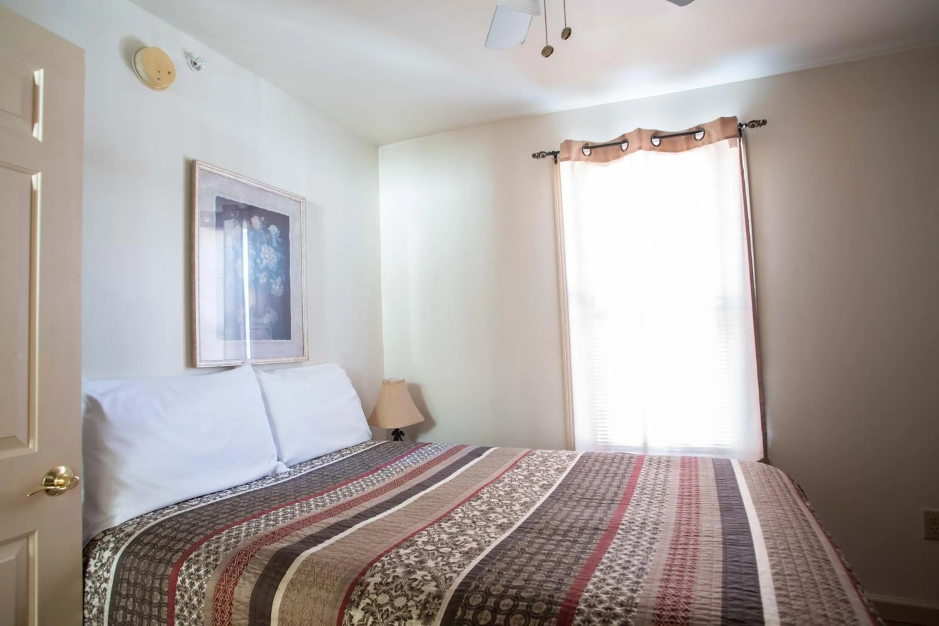 Bed in Swift River Suites