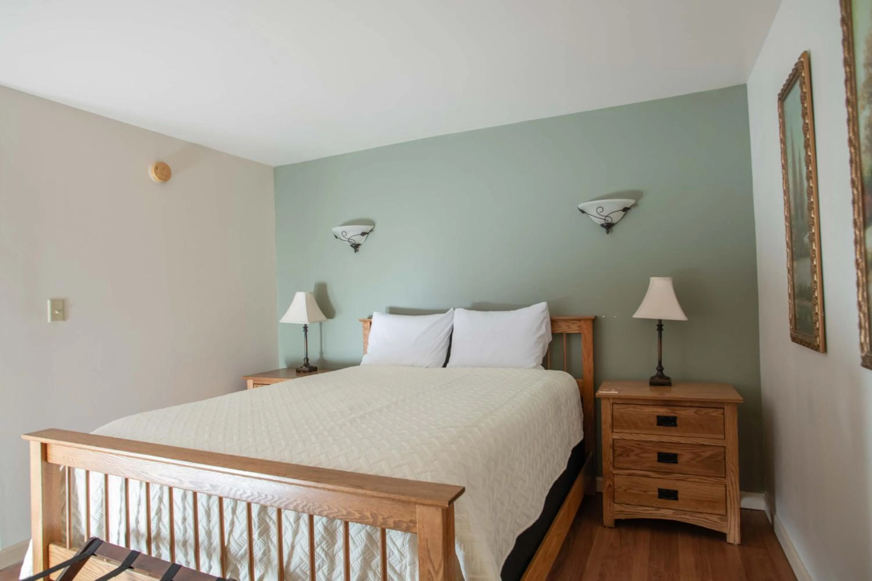 Bed in Swift River Suites