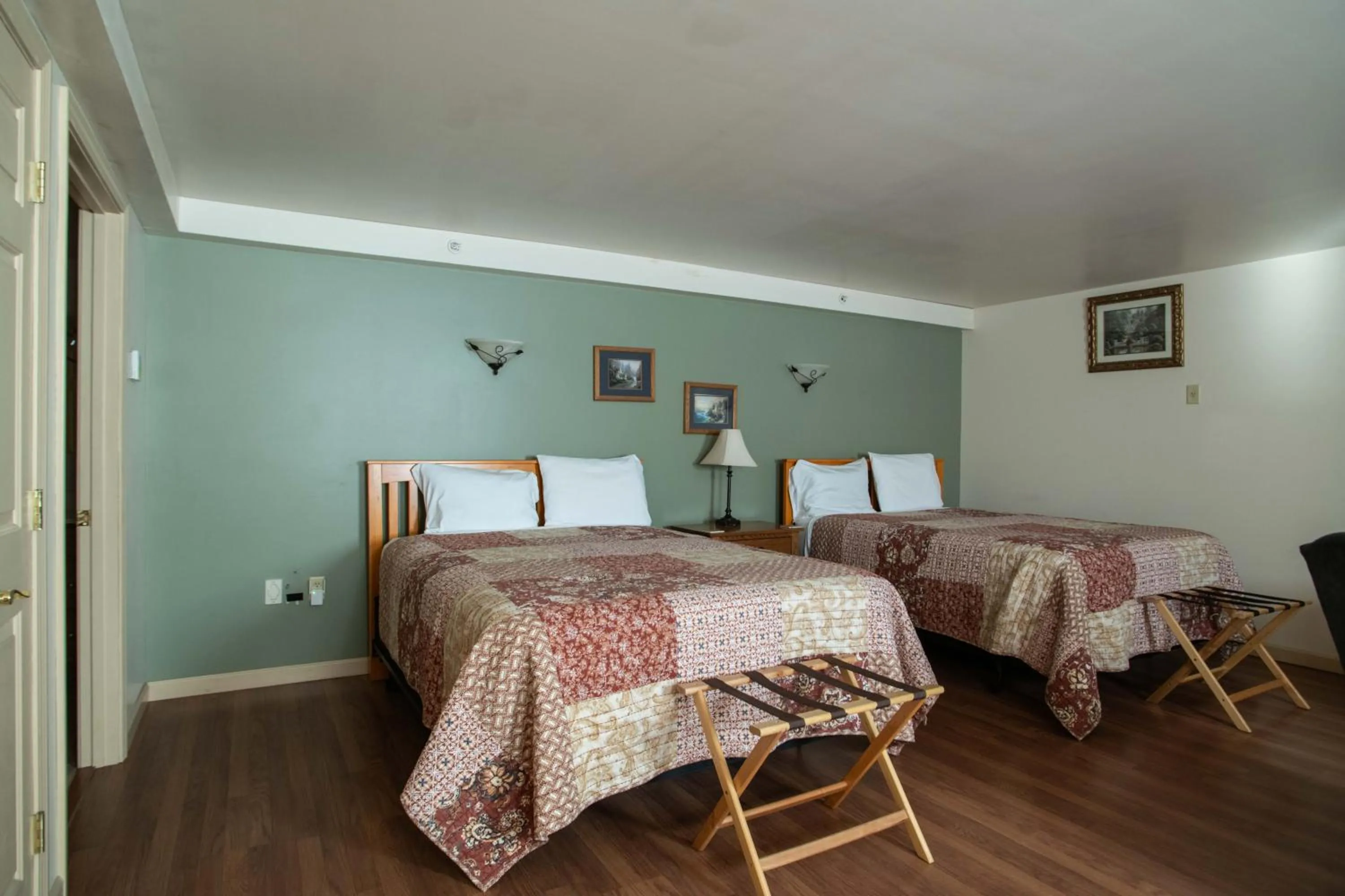 Bed in Swift River Suites