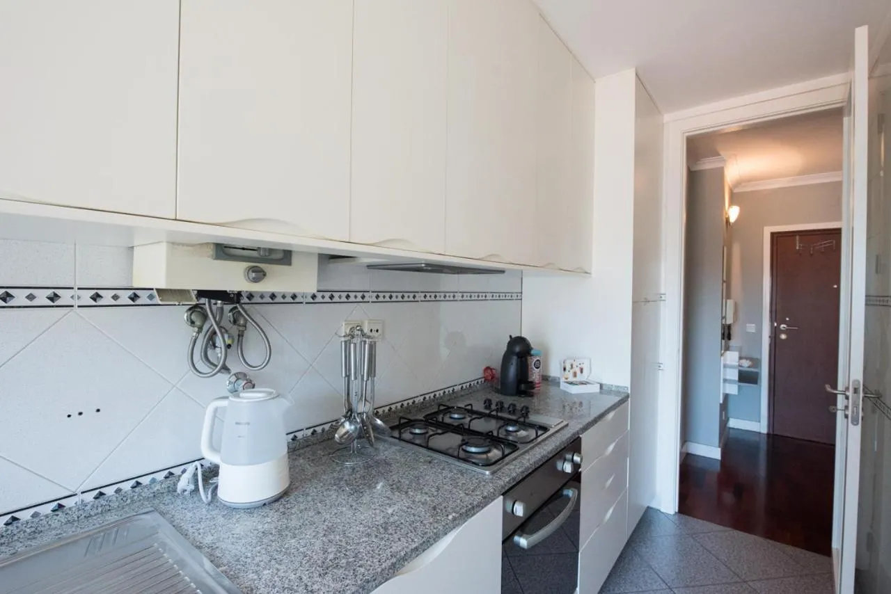 Kitchen or kitchenette in Apartamento Mouzinho de Albuquerque