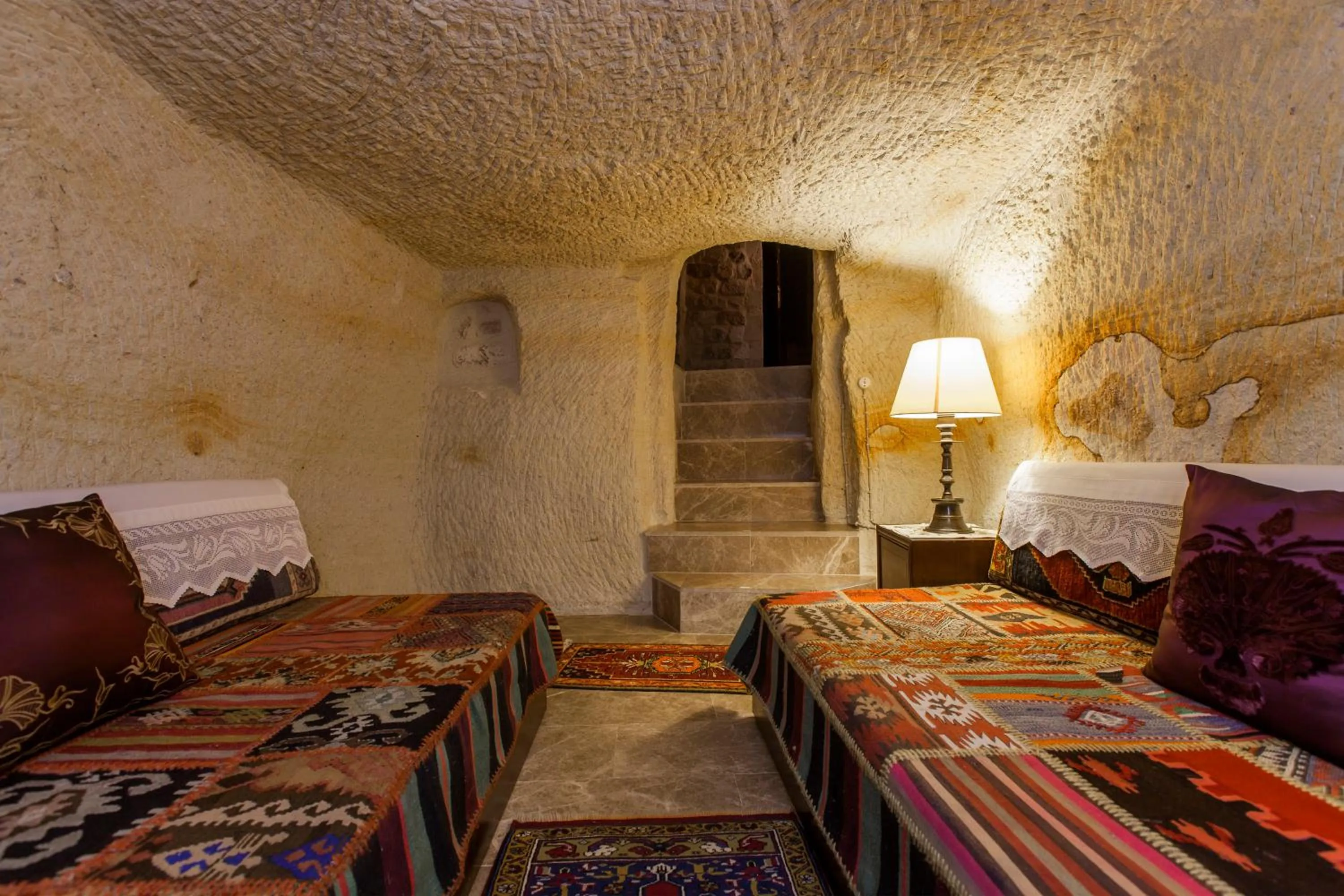 Seating area, Bed in Yunak Evleri Cappadocia