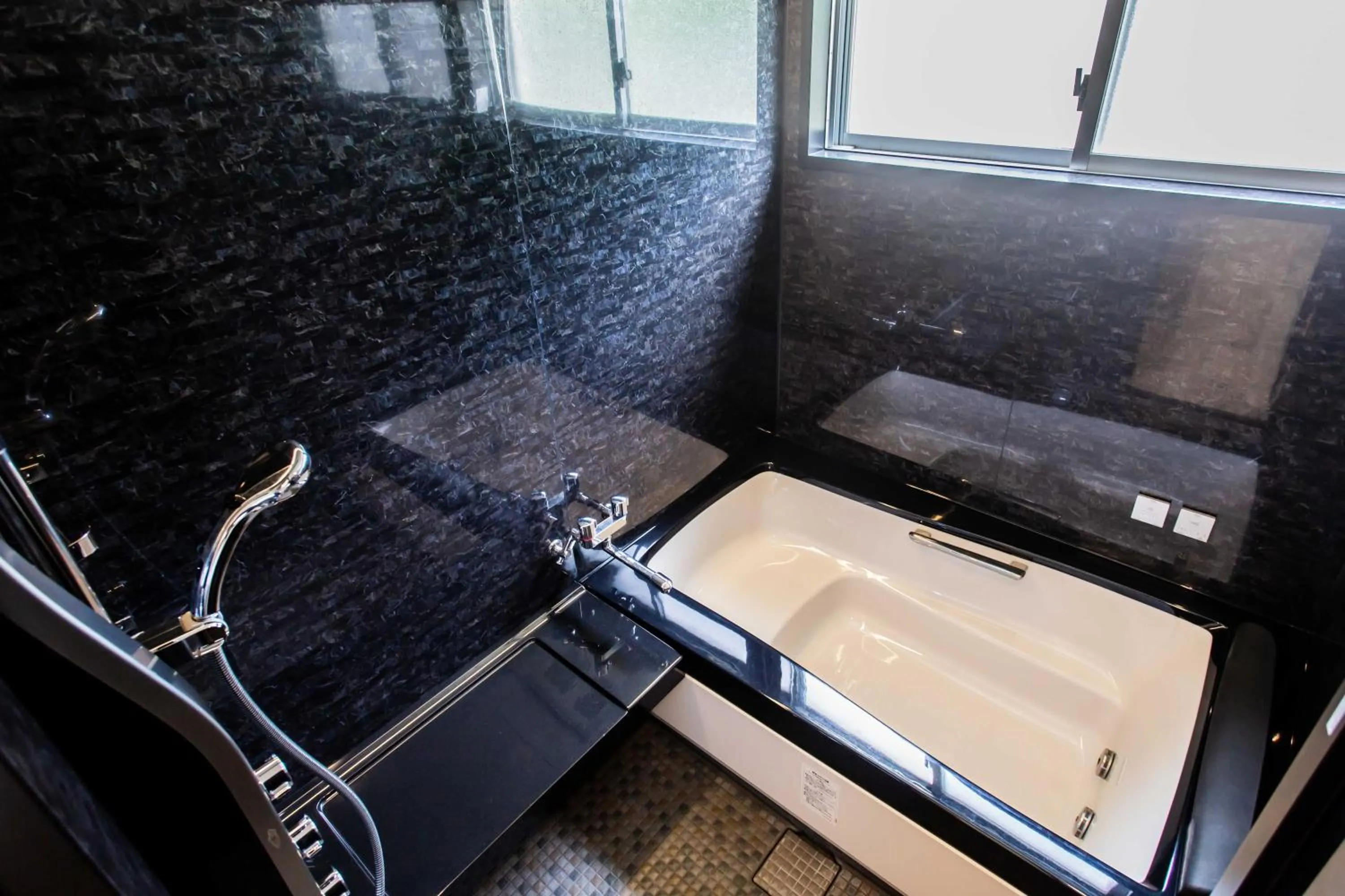 Bathroom in Hotel YANBARUNIA Nago