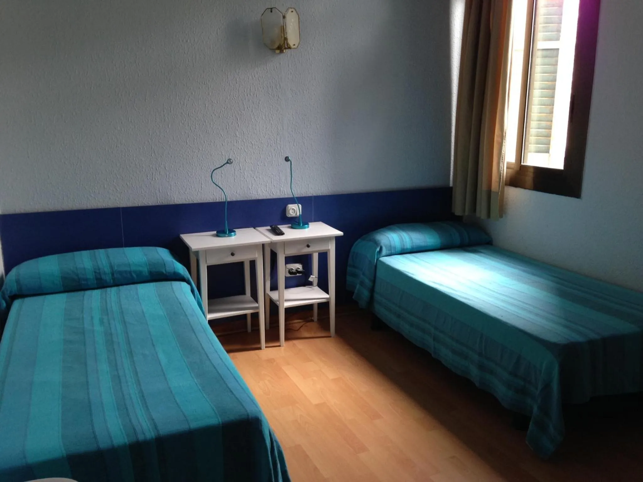 Photo of the whole room, Bed in Hostal Delfos