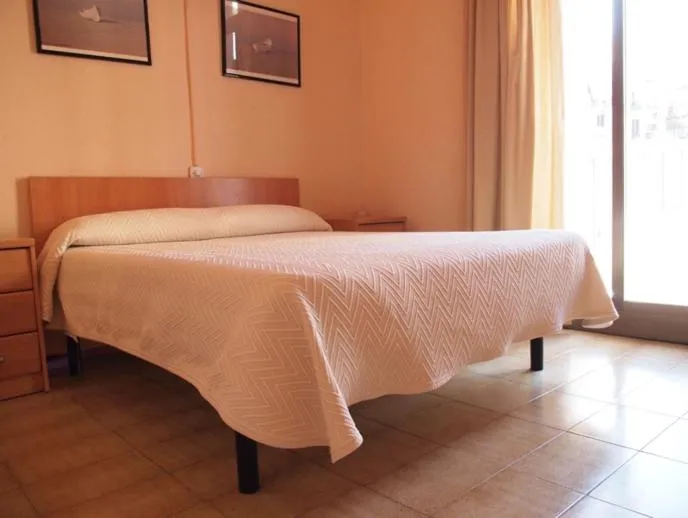 Photo of the whole room, Bed in Hostal Delfos