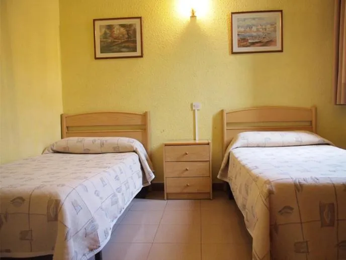 Photo of the whole room, Bed in Hostal Delfos