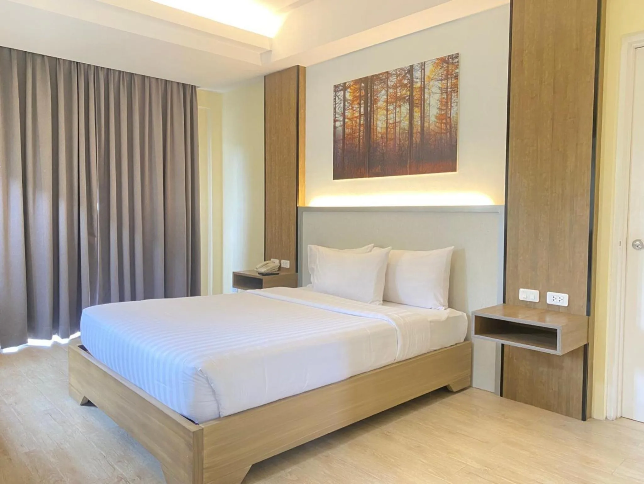 Bed in Aquamira Hotel & Resort