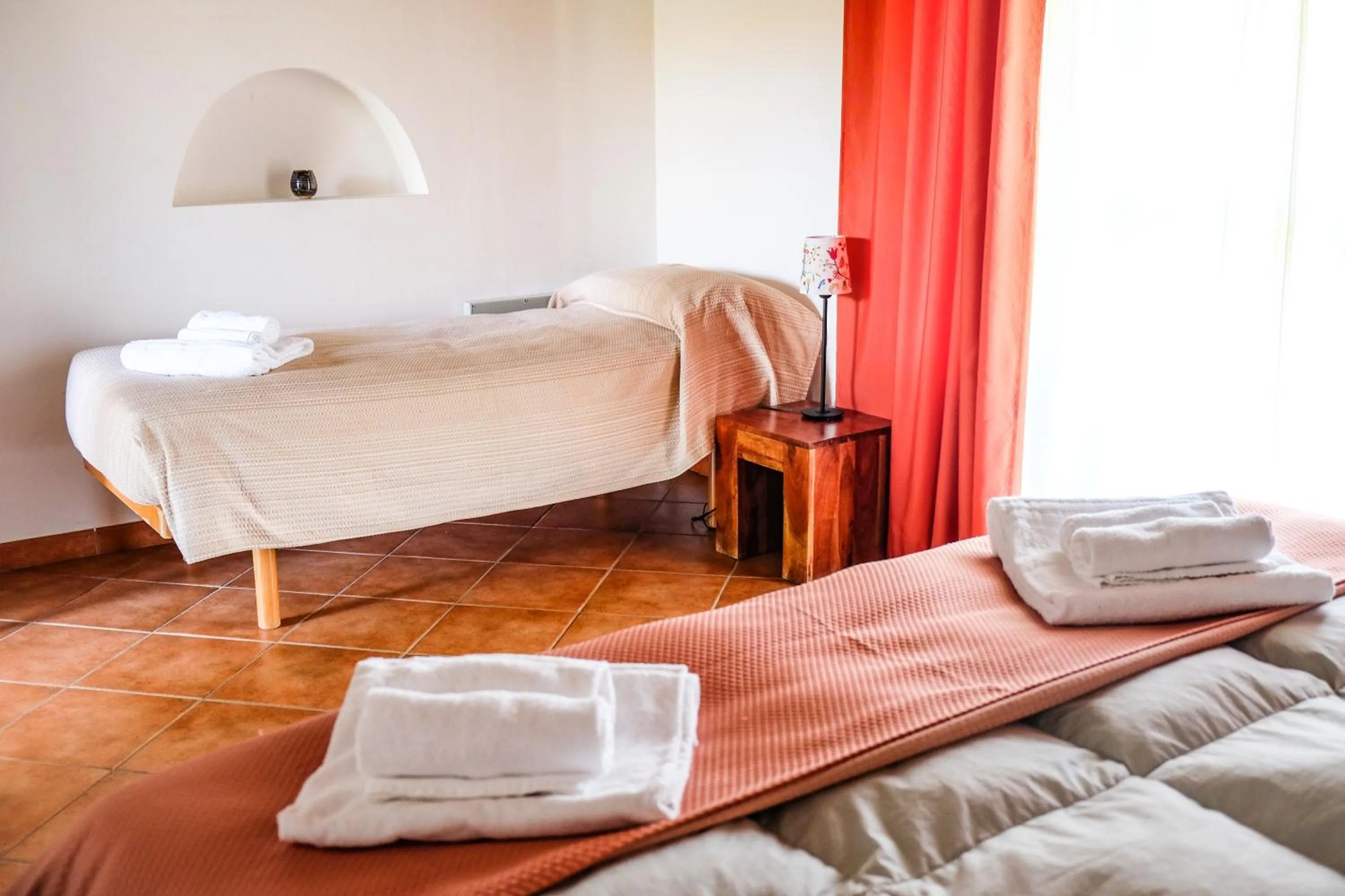 Bedroom, Bed in Agriturismo biologico Bulichella